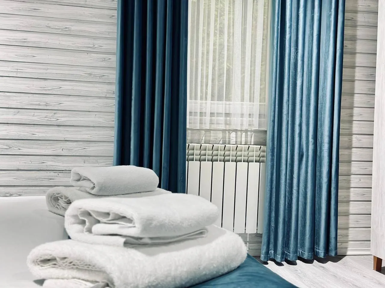 towels, Bed in Deluxe Park Qusar Resort & Spa Hotel