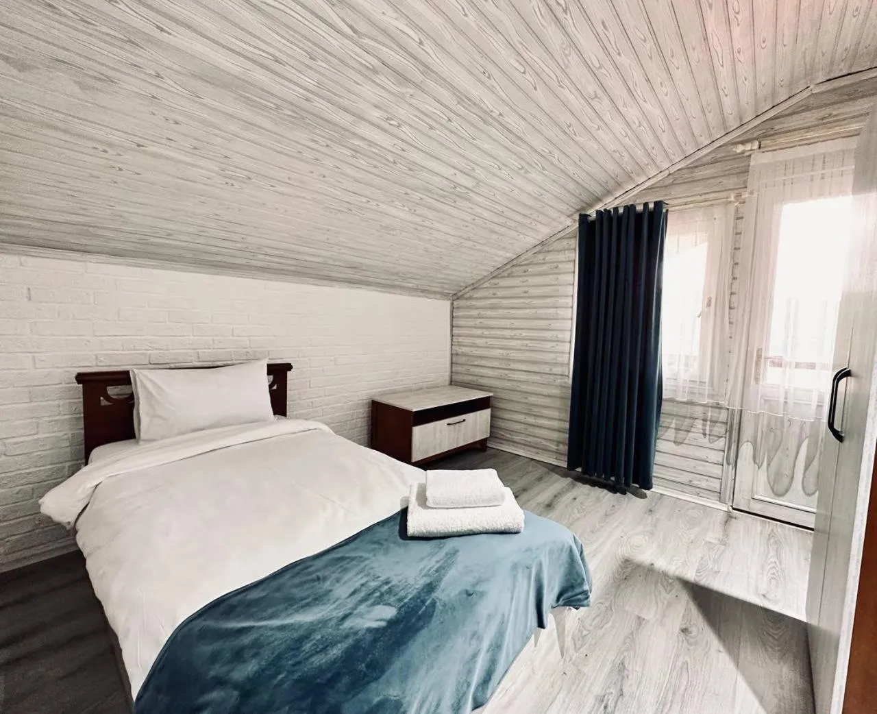 Bed in Deluxe Park Qusar Resort & Spa Hotel