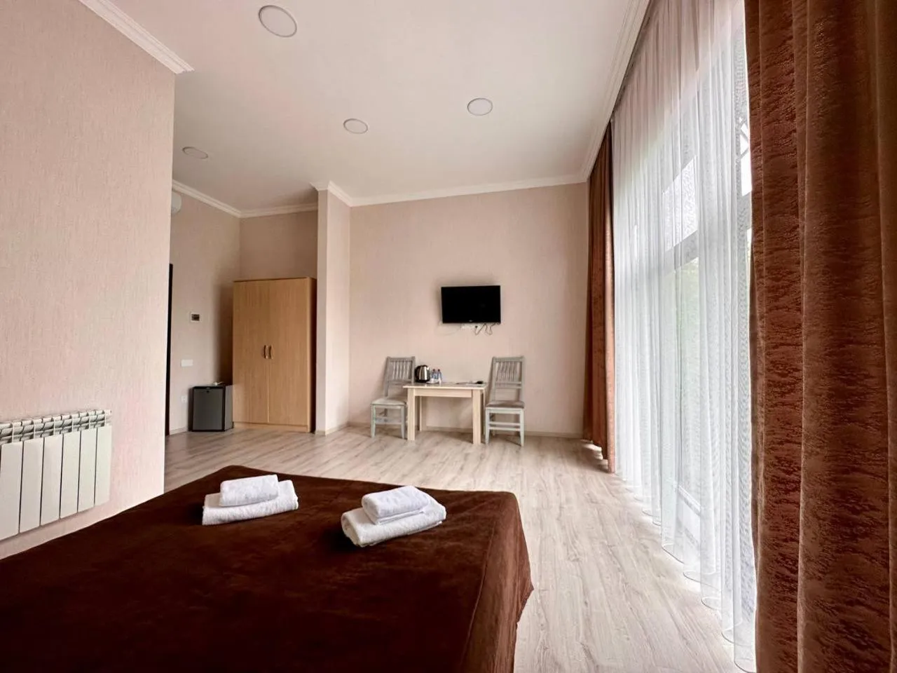 Bed in Deluxe Park Qusar Resort & Spa Hotel