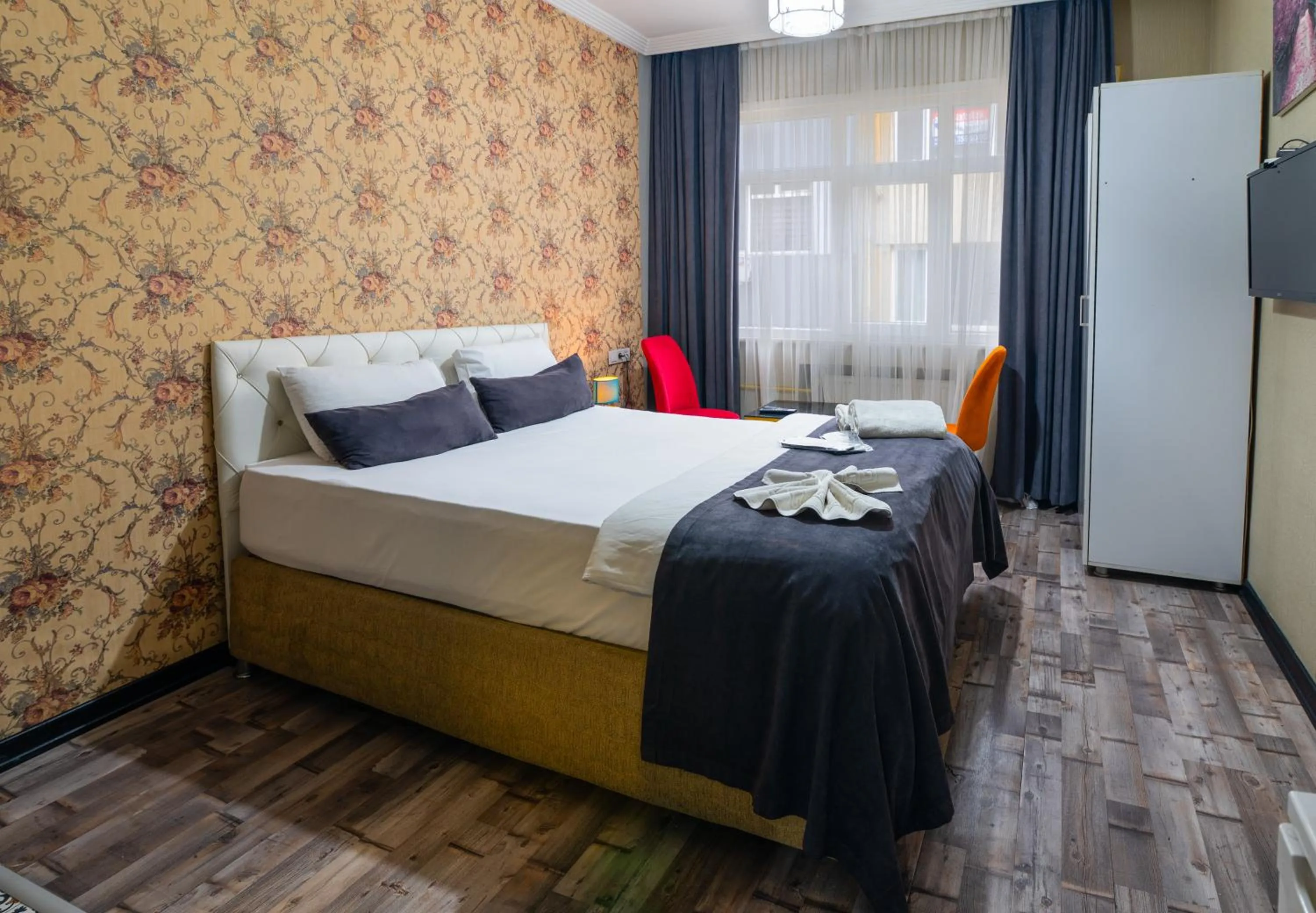 Bed in İmza Hotel Suite