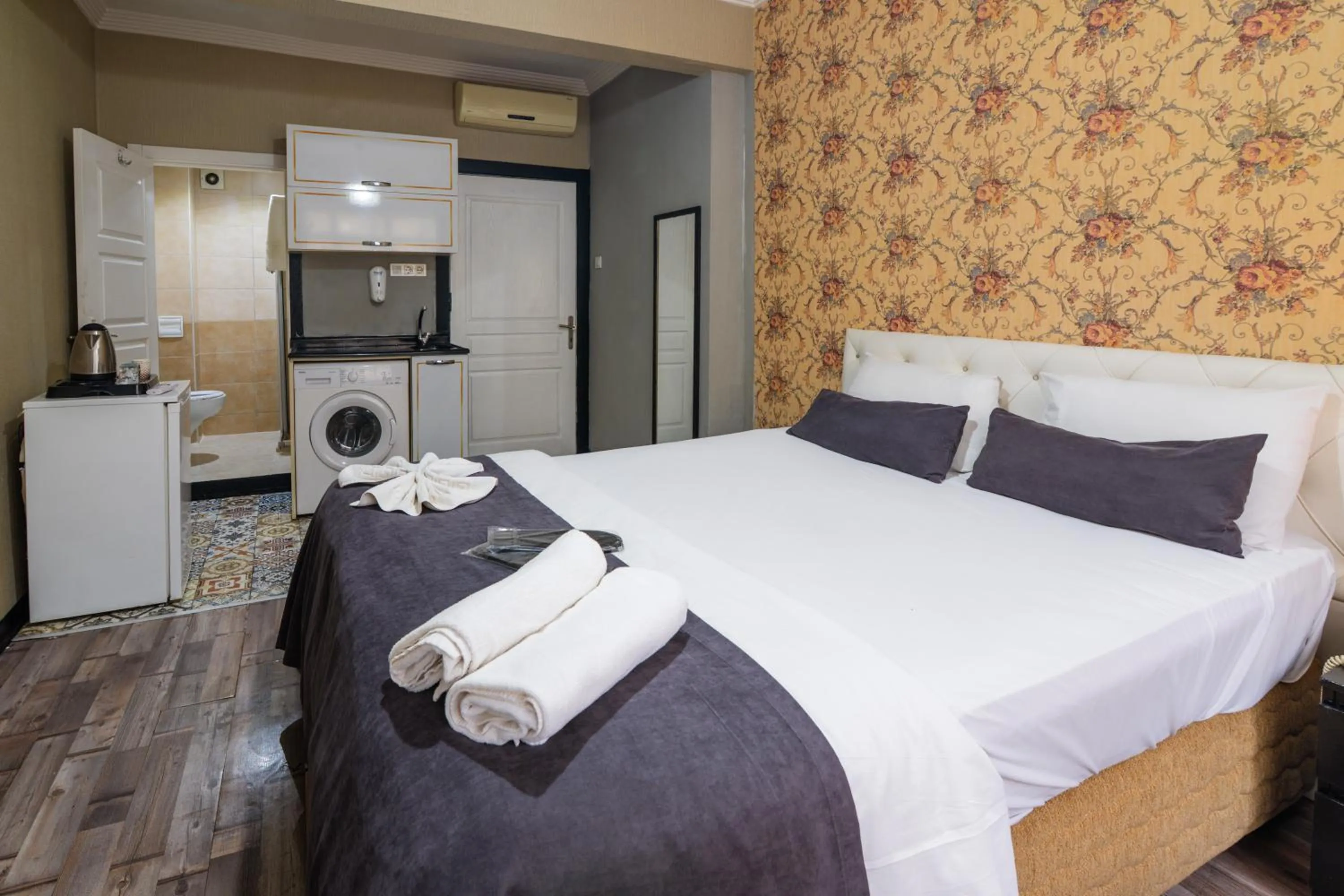 Bed in İmza Hotel Suite