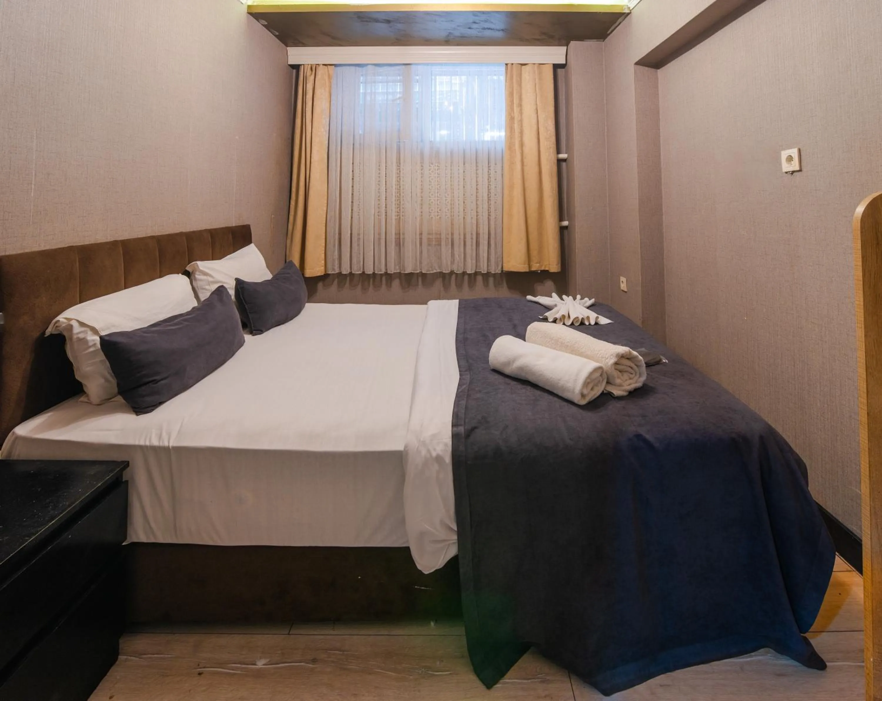 Bed in İmza Hotel Suite