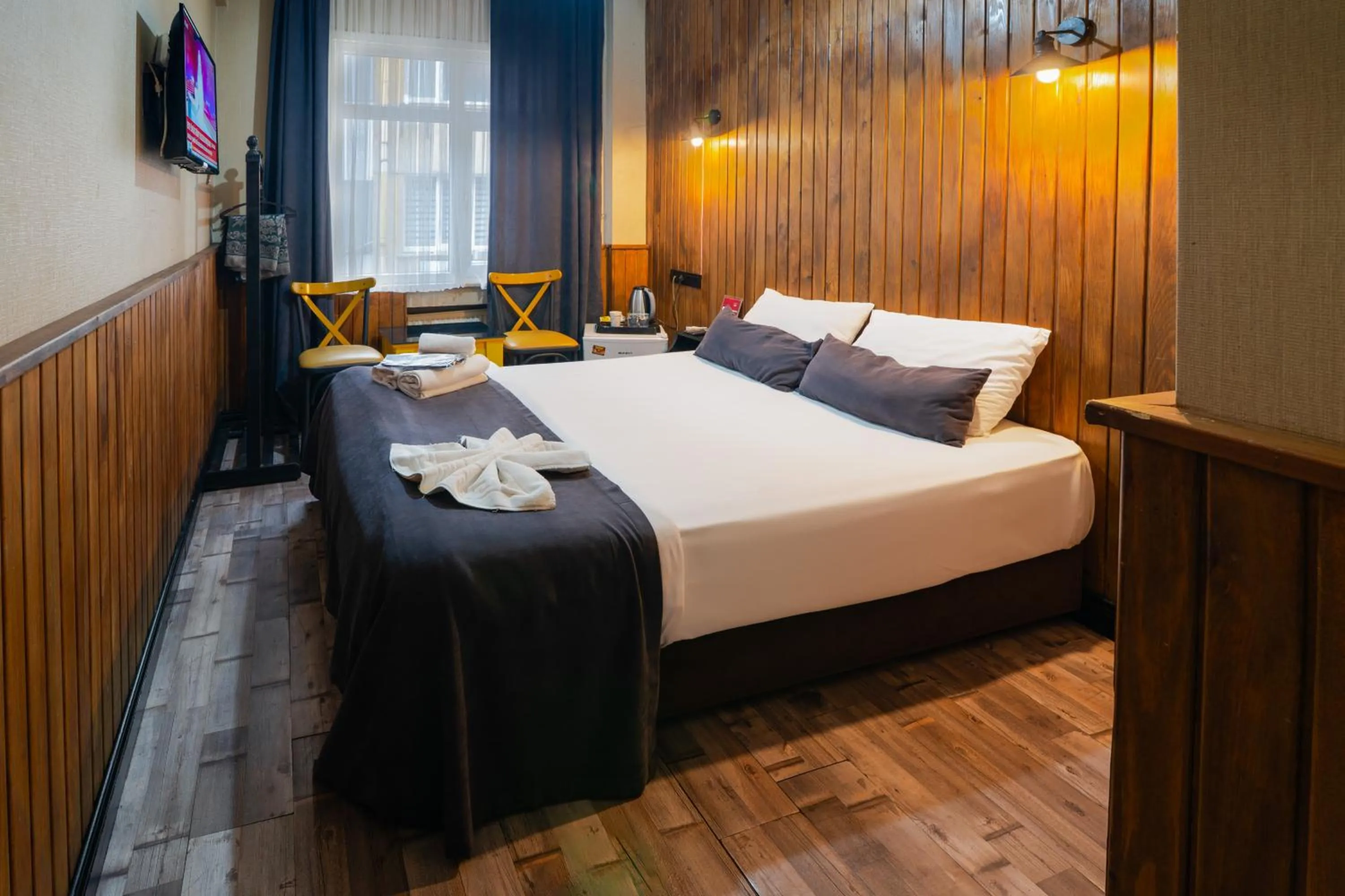 Bed in İmza Hotel Suite