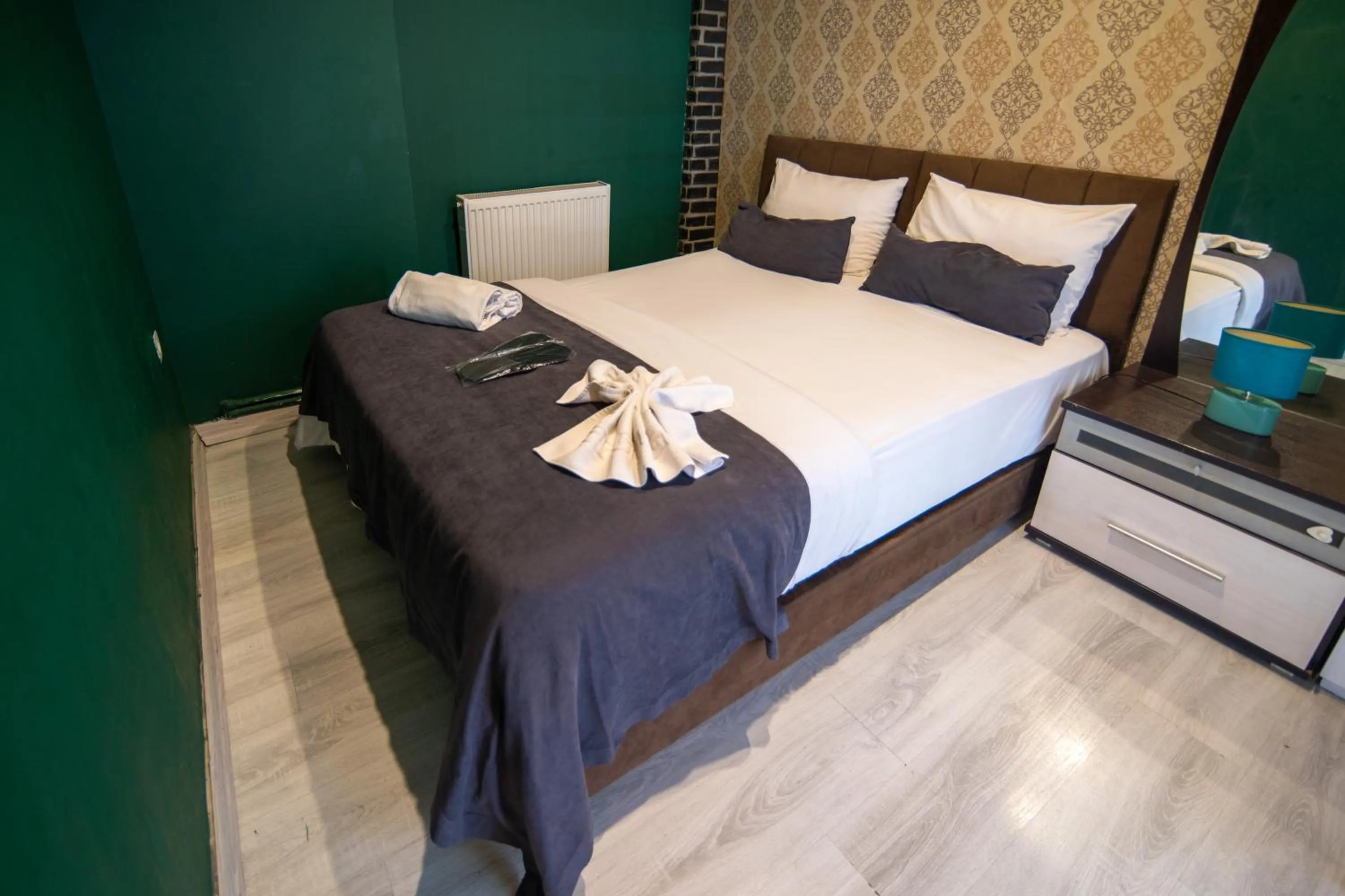 Bed in İmza Hotel Suite