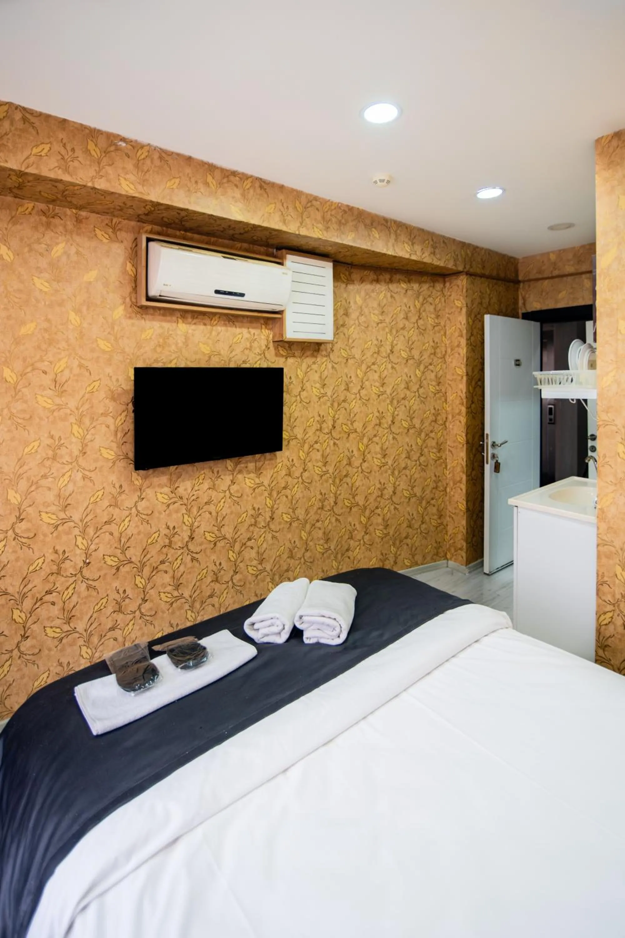 Bed in İmza Hotel Suite