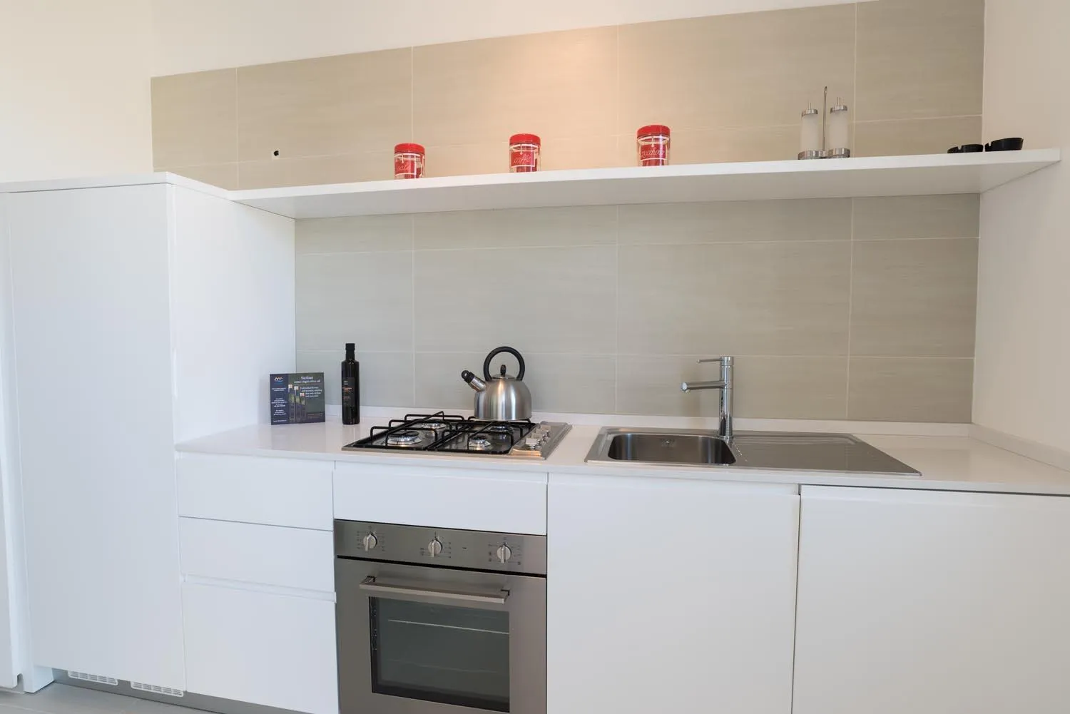 Kitchen or kitchenette in Appartamenti Sud Est