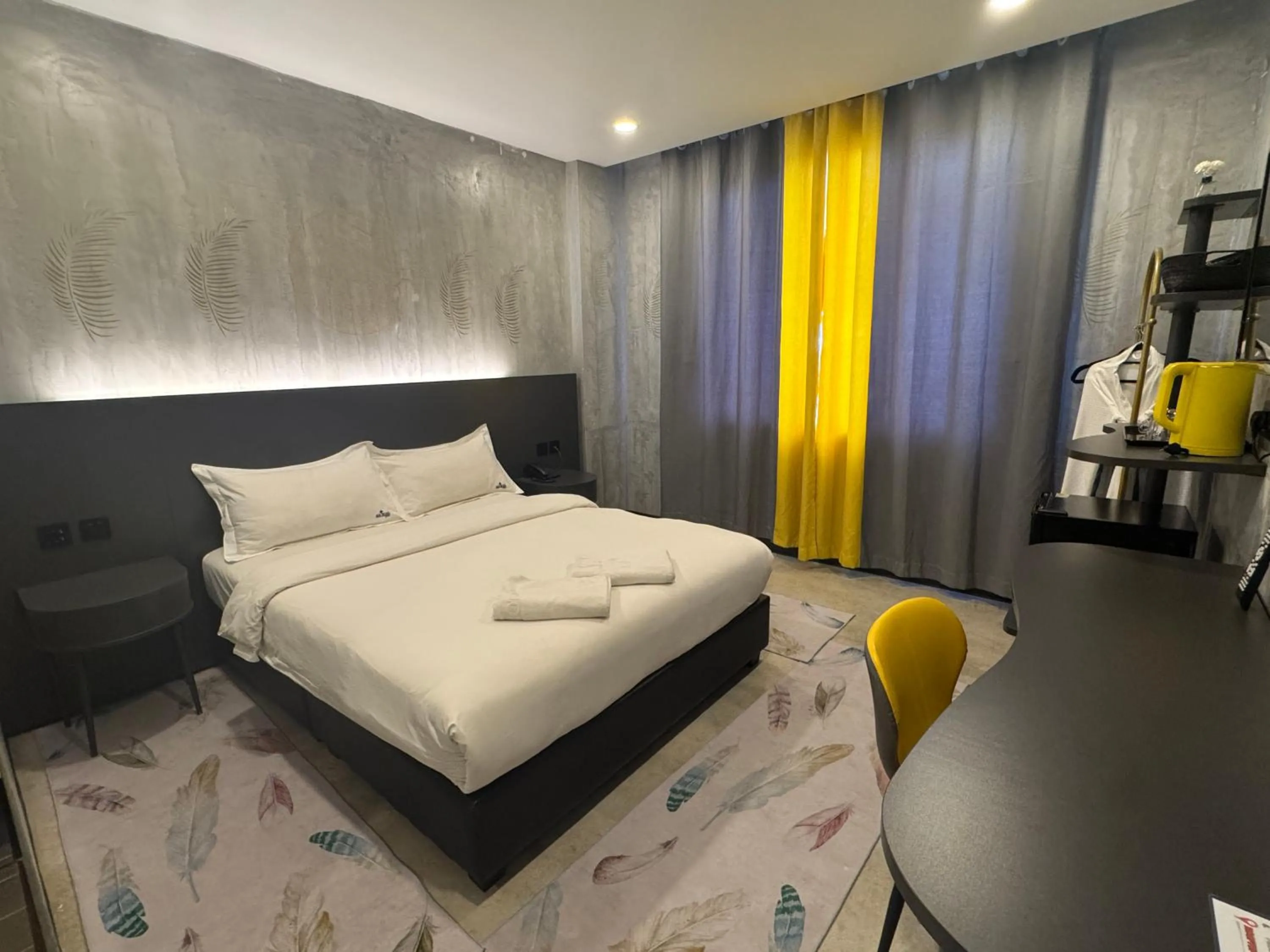 Bed in Sri Indar Hotel & Suites