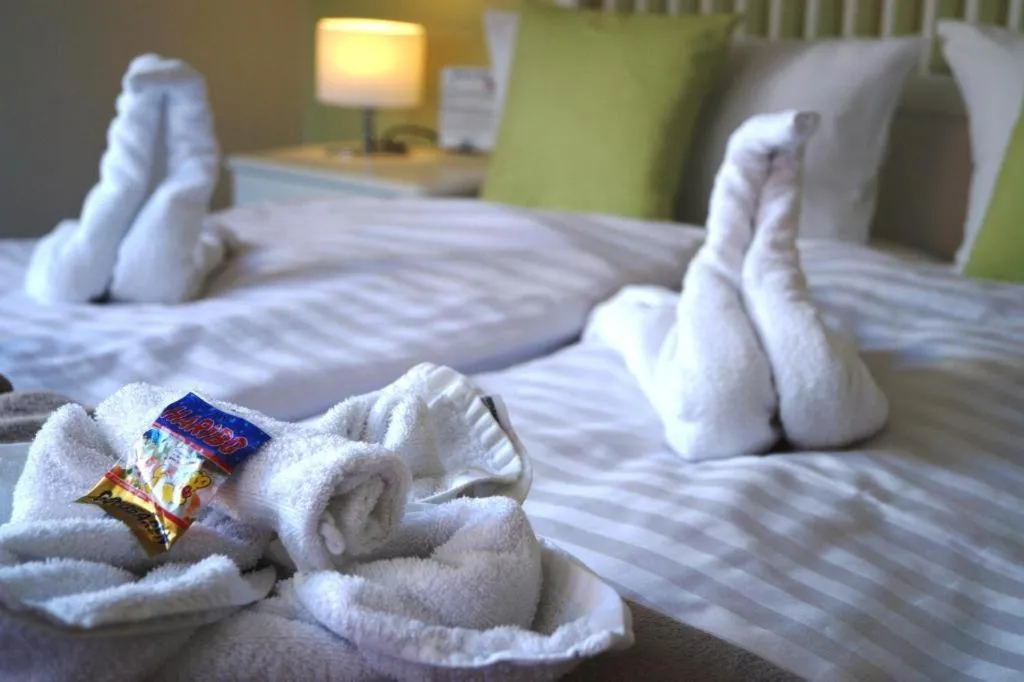 Bed in REGIOHOTEL Aparthotel Wernigerode