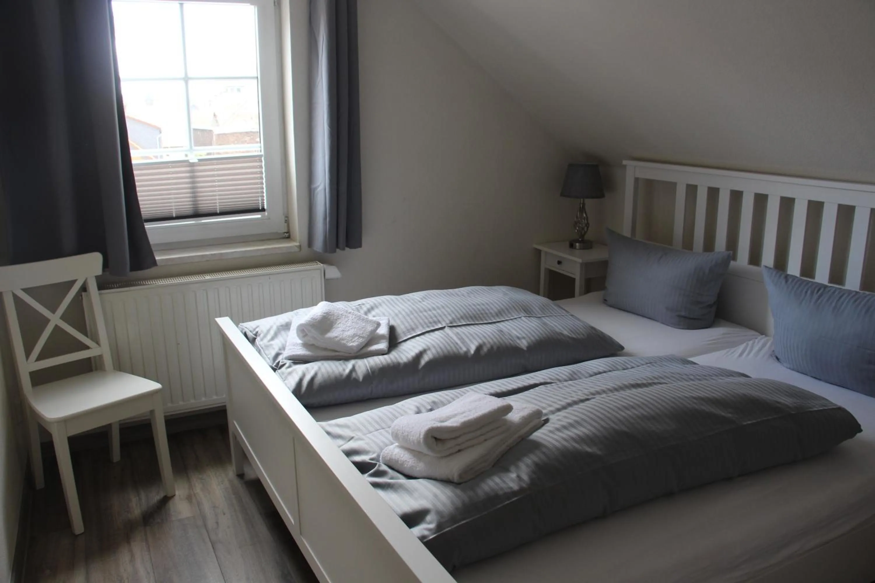 Bed in REGIOHOTEL Aparthotel Wernigerode