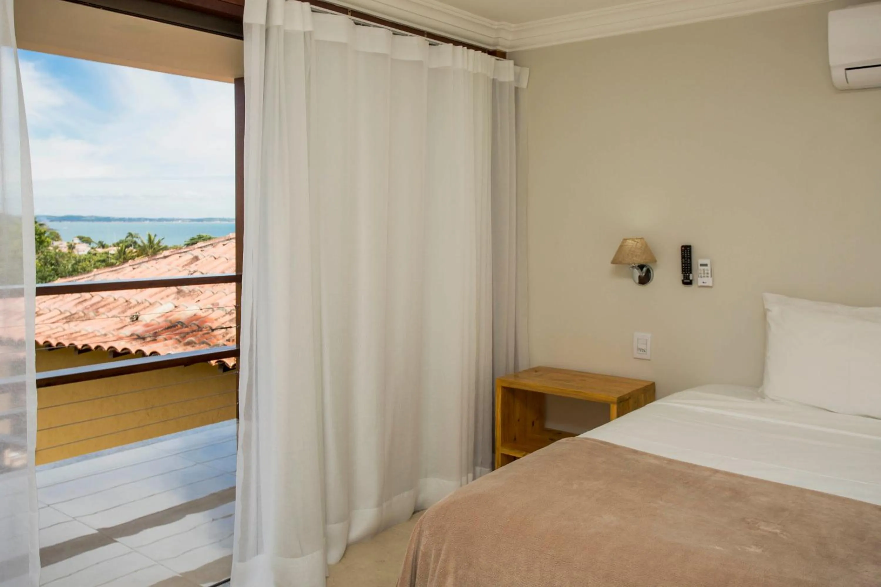 Bed in Pousada Blue Ocean