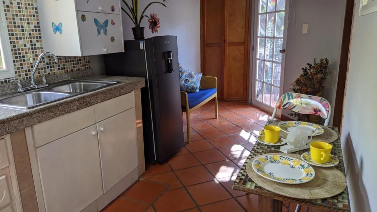 Kitchen or kitchenette in Portoazul Casa de Playa
