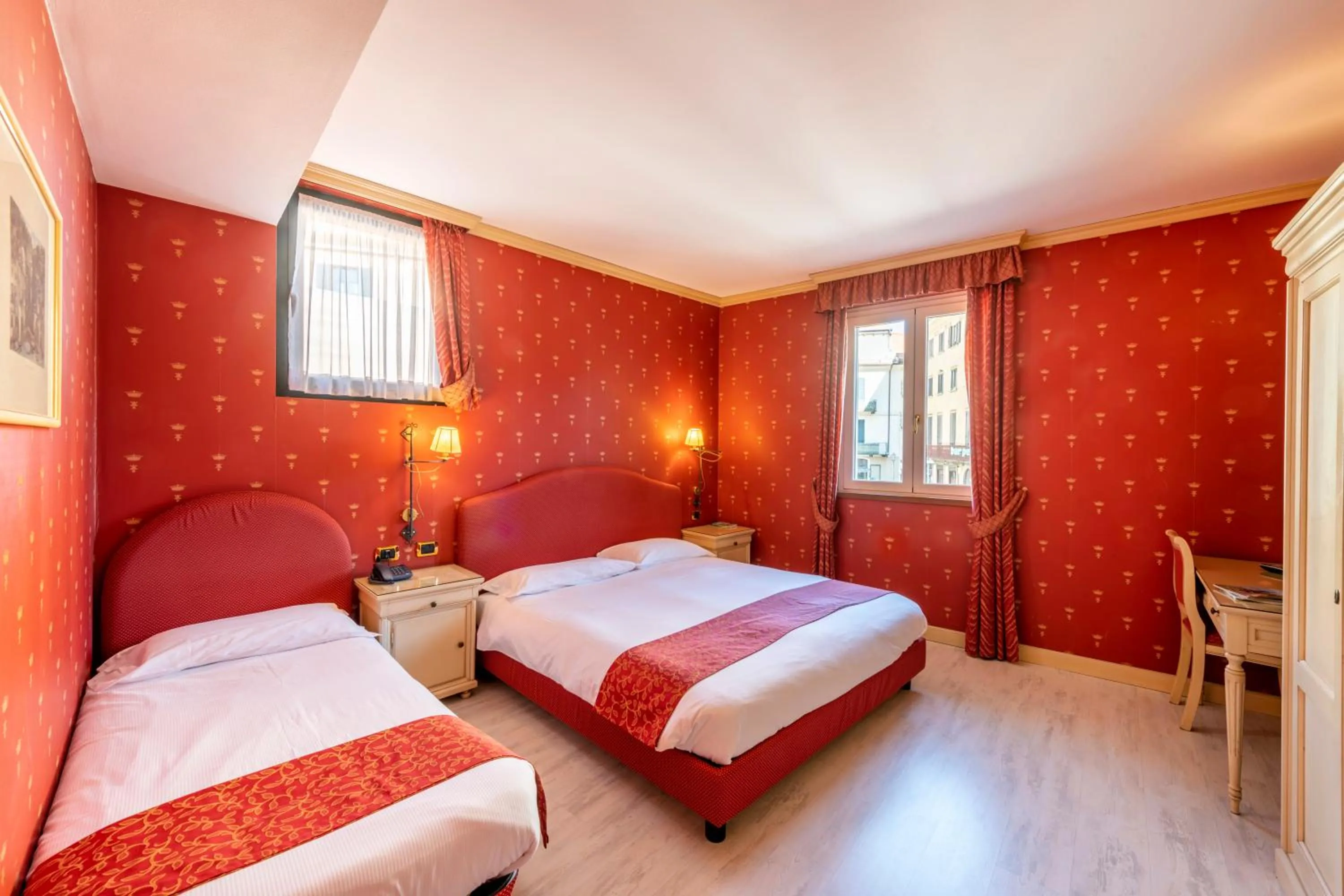 Photo of the whole room, Bed in Hotel Du Lac Menaggio