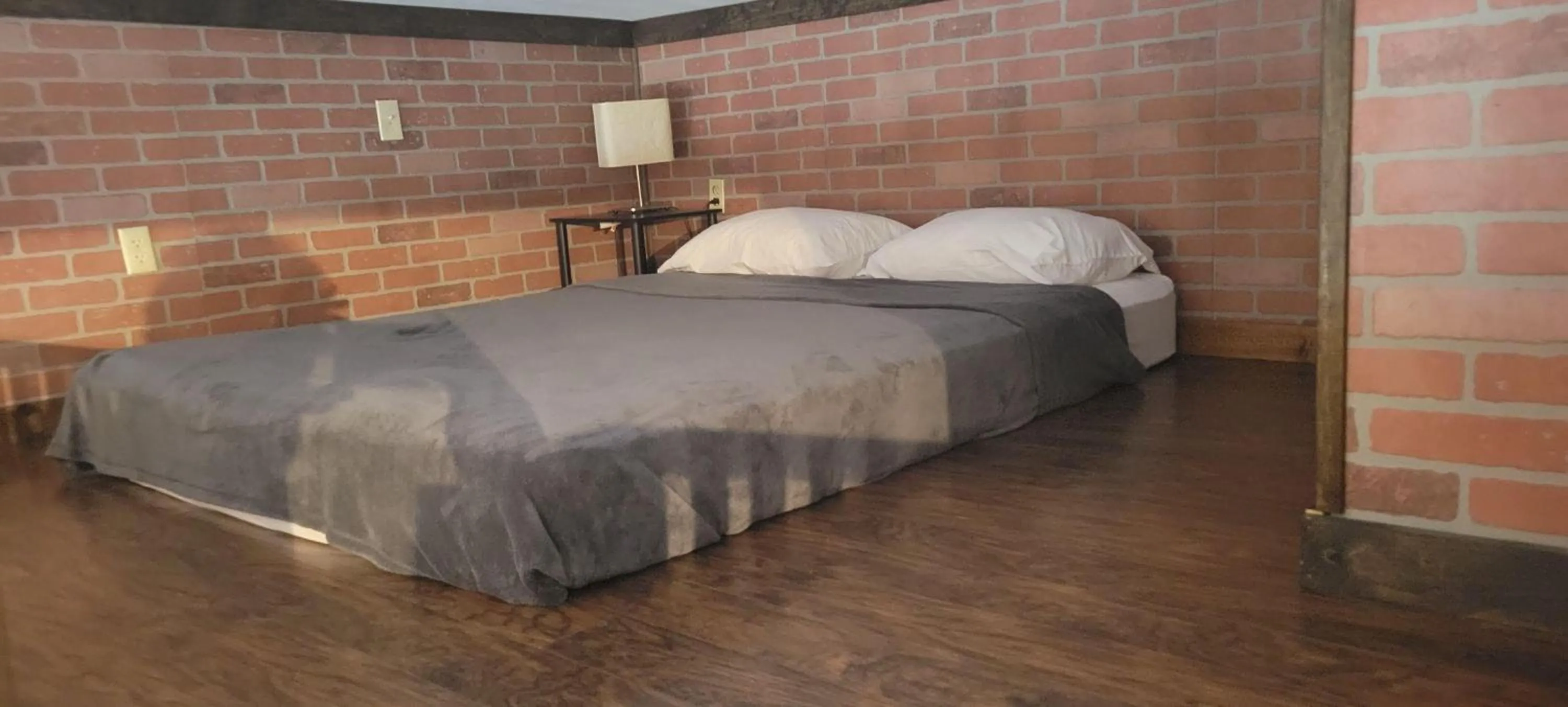 Bed in Downhill Lodge Condominium