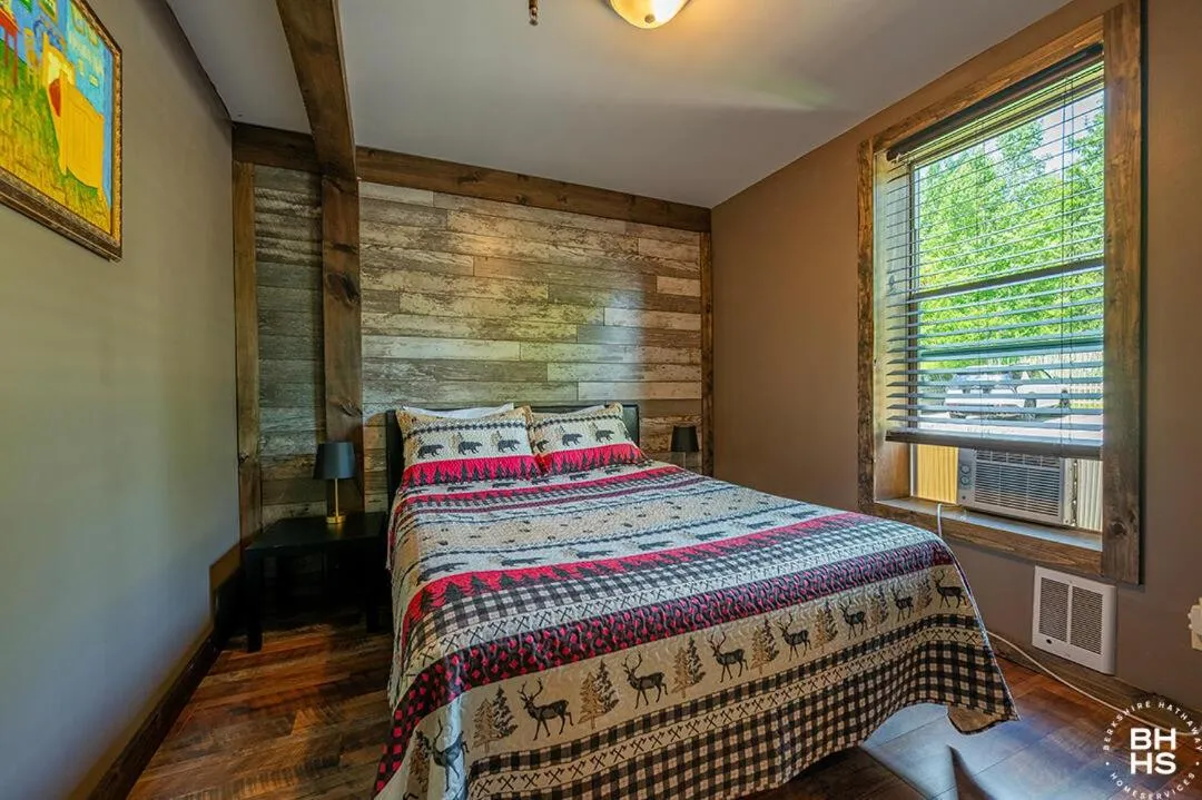 Bed in Downhill Lodge Condominium