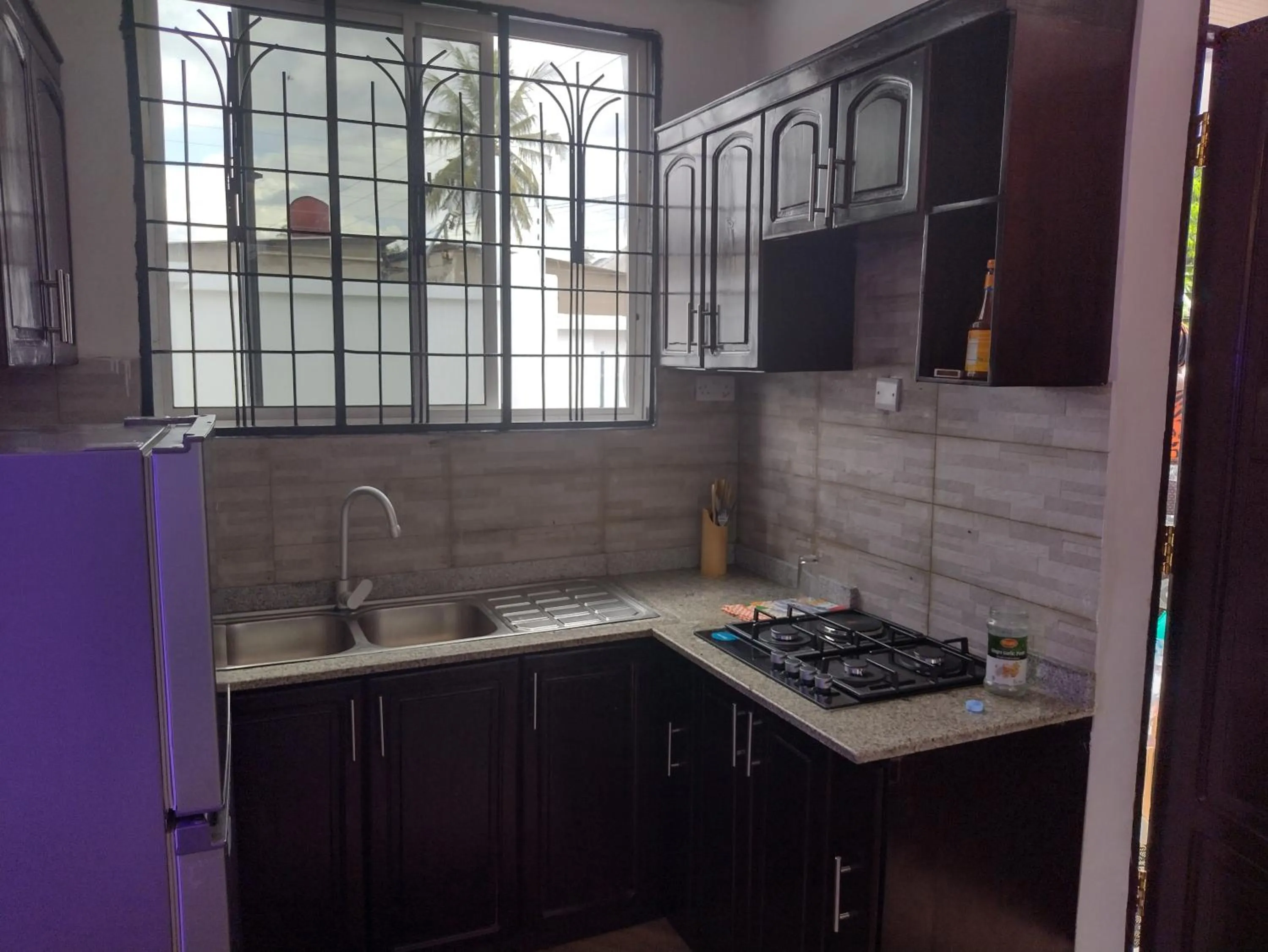 Kitchen or kitchenette in Mkamiti Villa - Airport Hotel with Free Shuttle