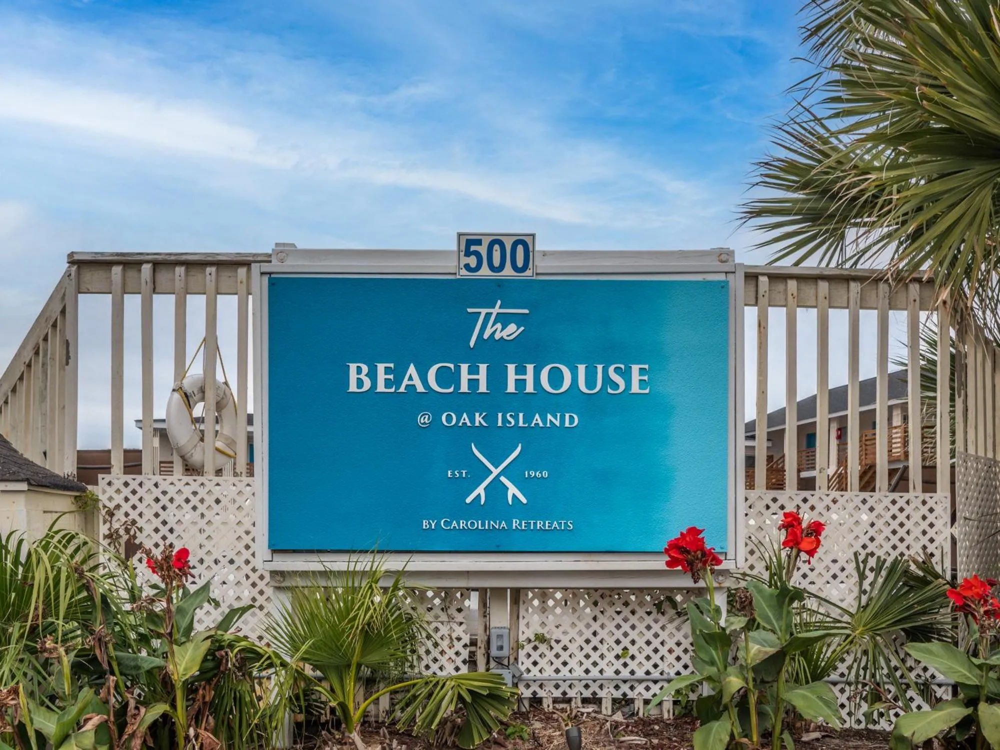 Property building in The Beach House at Oak Island by Carolina Resorts