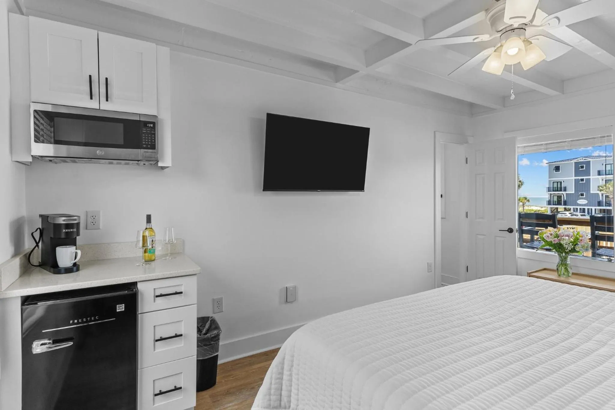 TV and multimedia, Bed in The Beach House at Oak Island by Carolina Resorts
