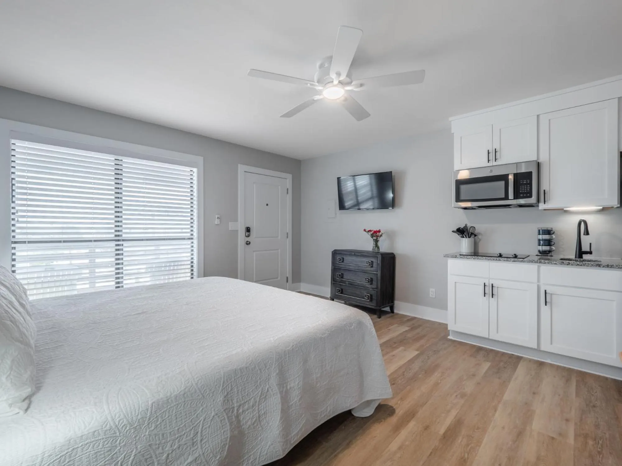 Property building, Bed in The Beach House at Oak Island by Carolina Resorts