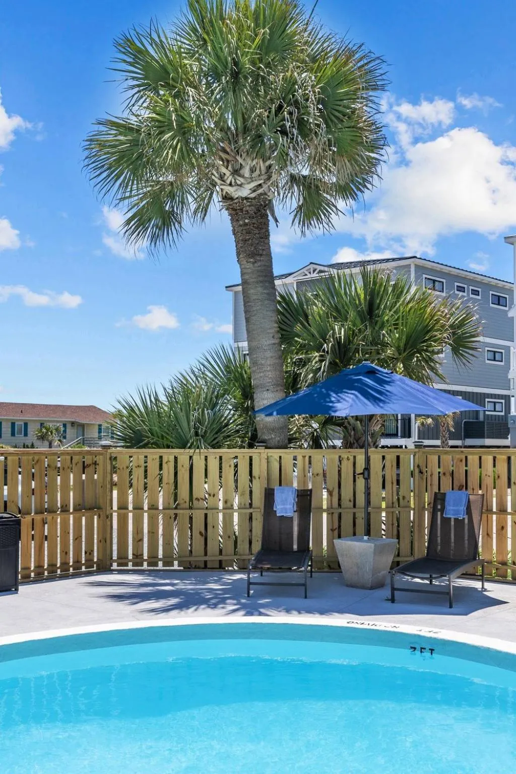 Property building in The Beach House at Oak Island by Carolina Resorts