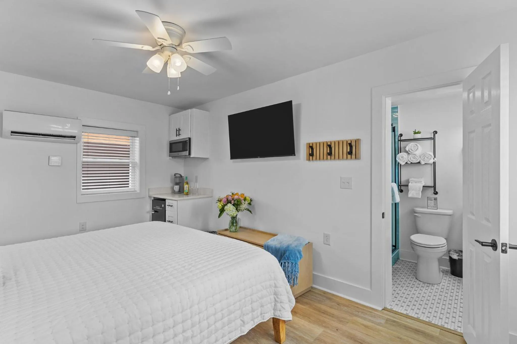 Bed in The Beach House at Oak Island by Carolina Resorts