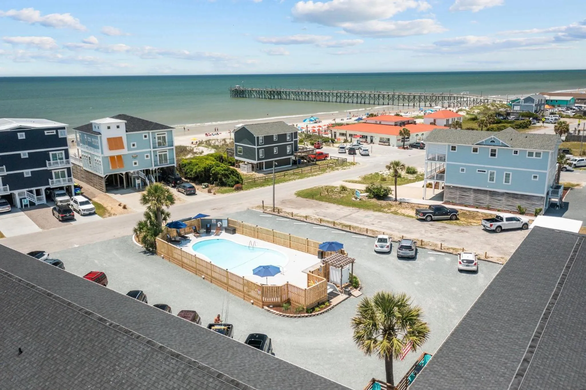 Property building in The Beach House at Oak Island by Carolina Resorts