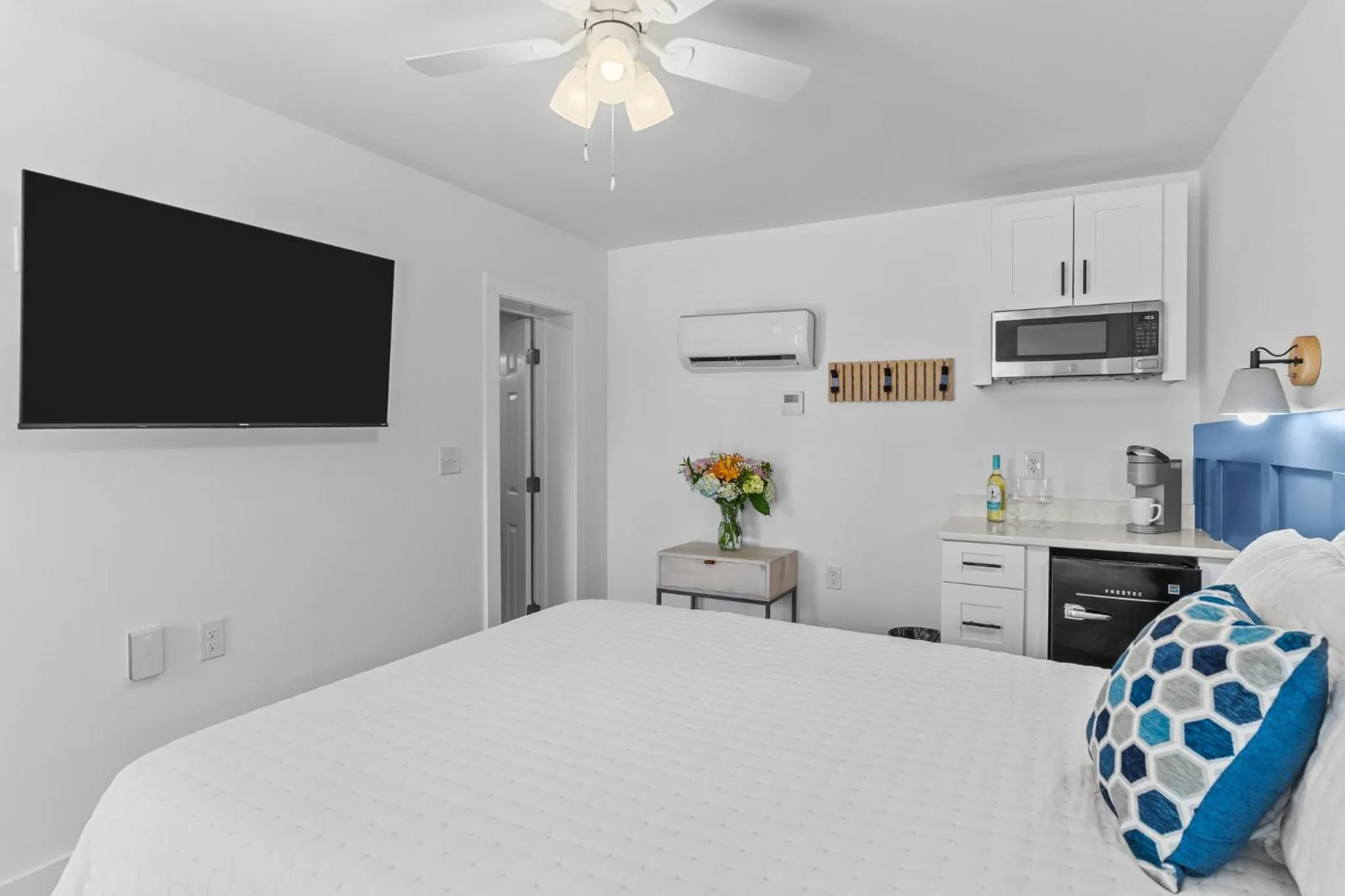 Bed in The Beach House at Oak Island by Carolina Resorts