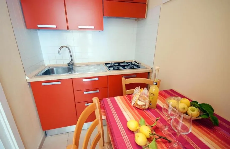 Kitchen or kitchenette in Appartamenti - Villa Mare
