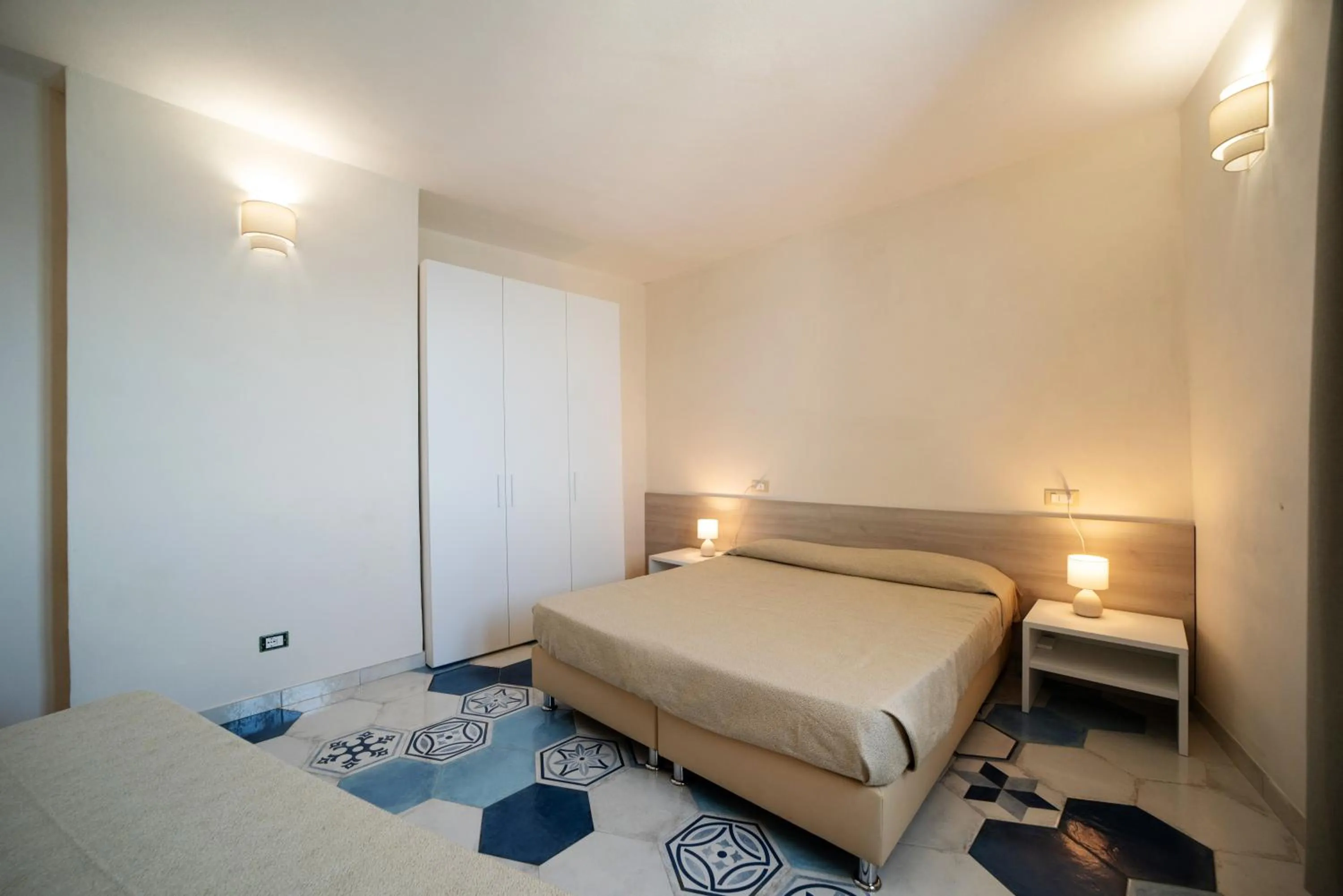 Bed in Appartamenti - Villa Mare