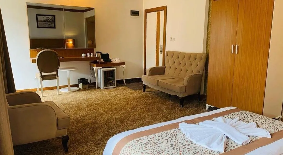 Photo of the whole room, Bed in Uluhan Hotel