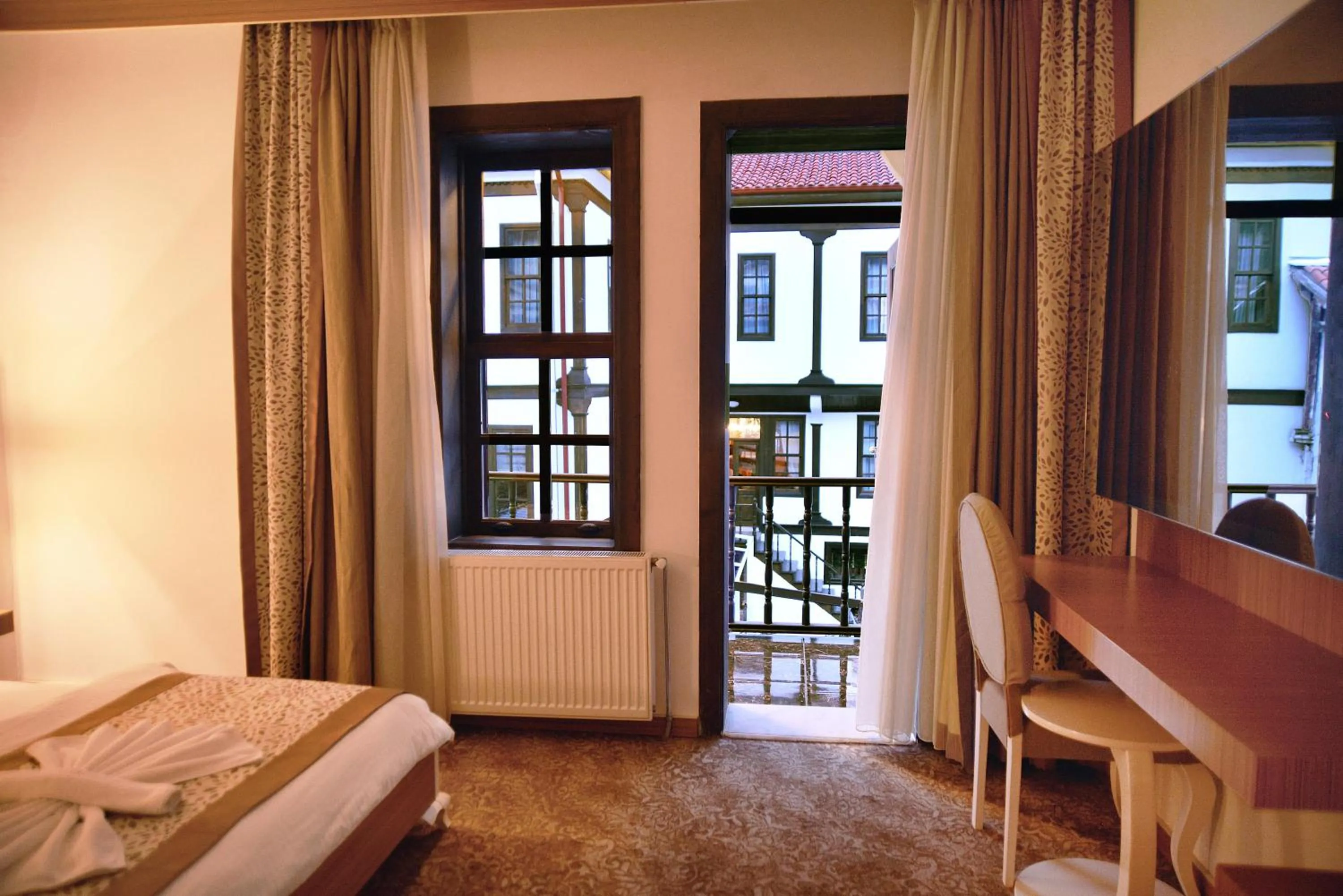 Photo of the whole room, Bed in Uluhan Hotel