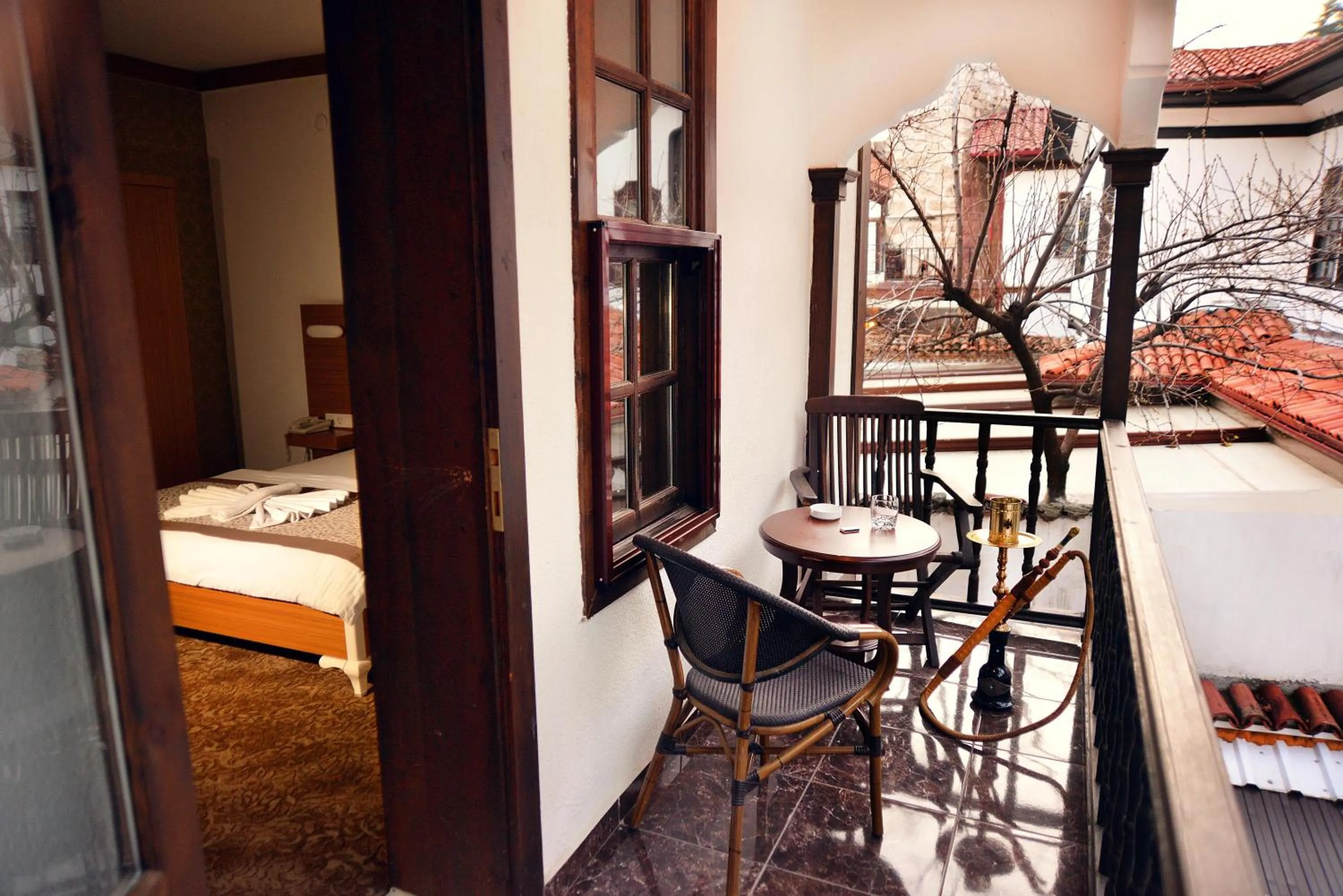 Balcony/Terrace, Bed in Uluhan Hotel