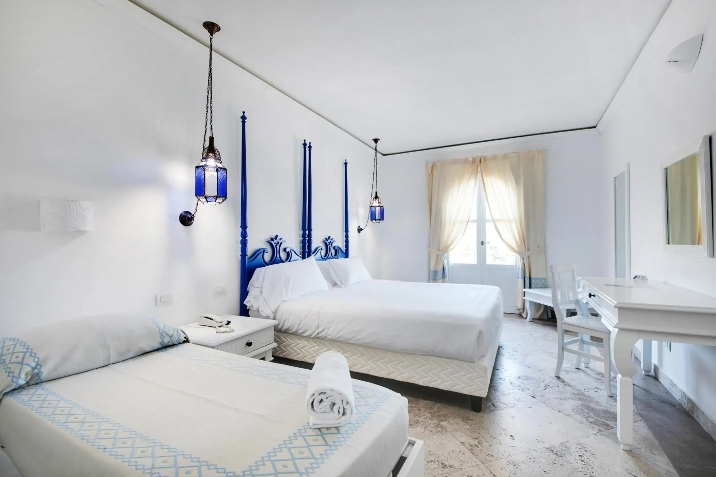 Classic Triple Room in Phi Hotel Sighientu Classic Triple Room in Phi Hotel Sighientu