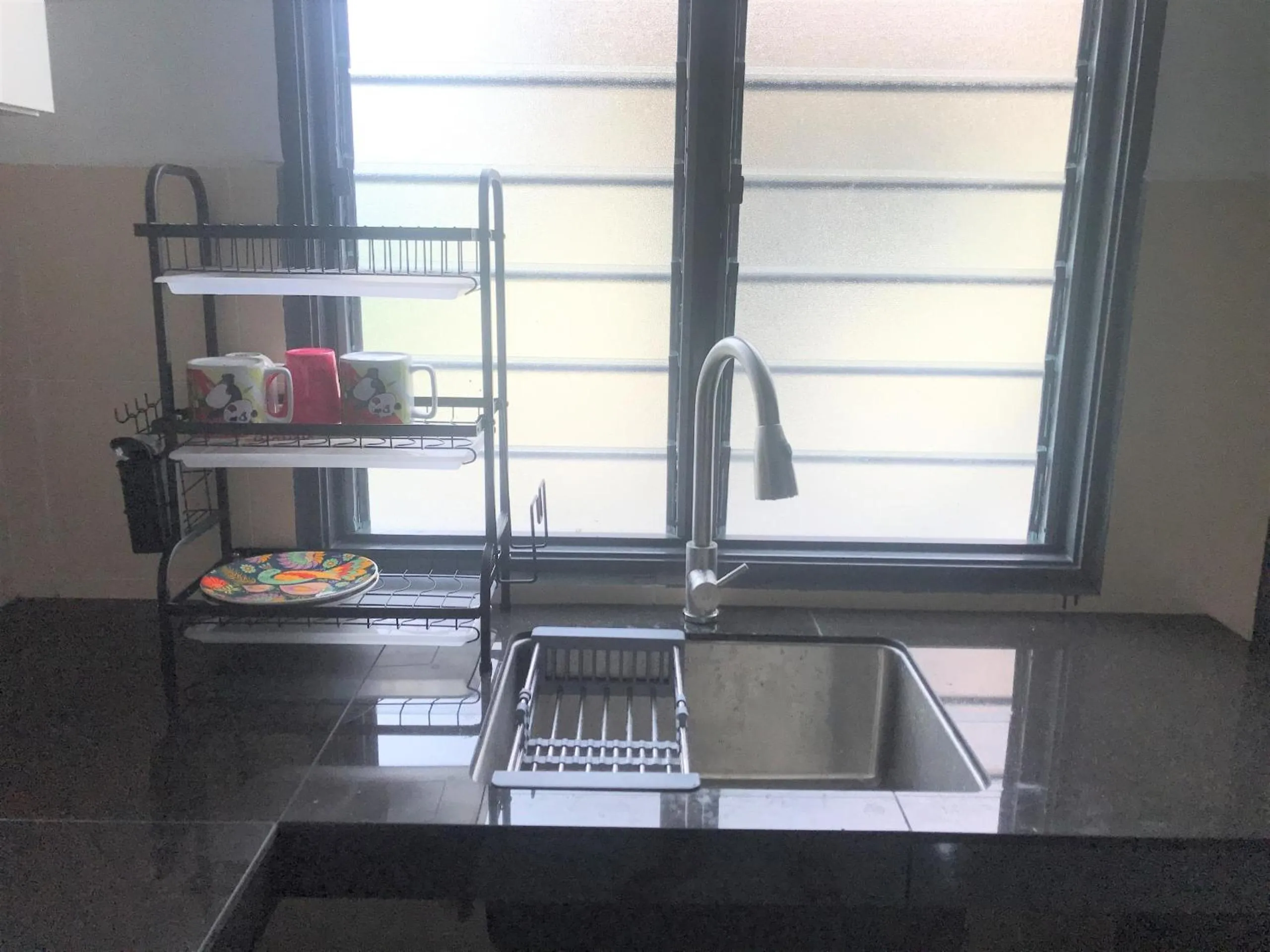 Kitchen or kitchenette in OYO 90493 JL Homestay