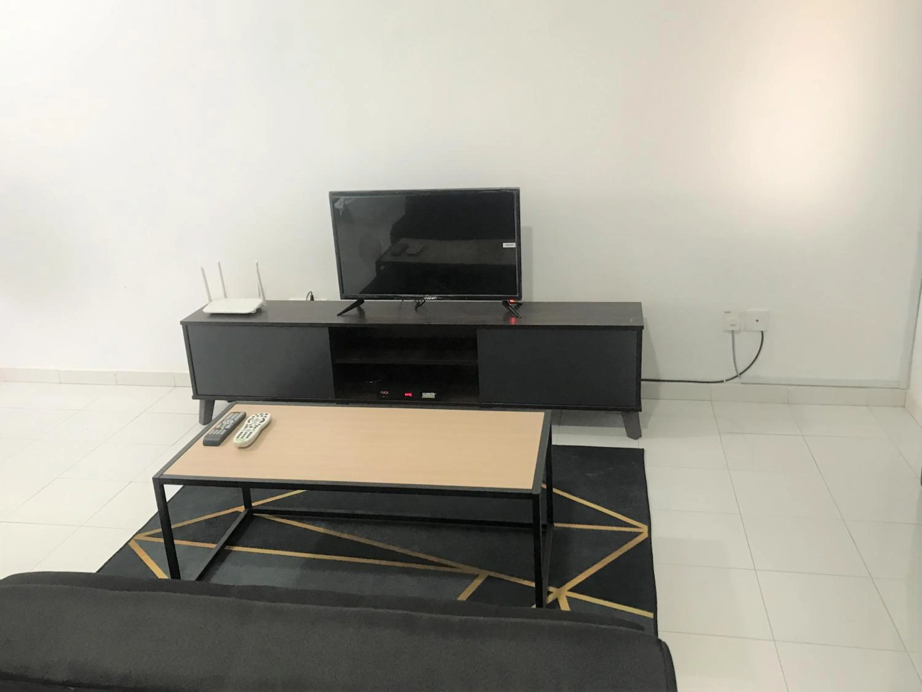 Living room in OYO 90493 JL Homestay