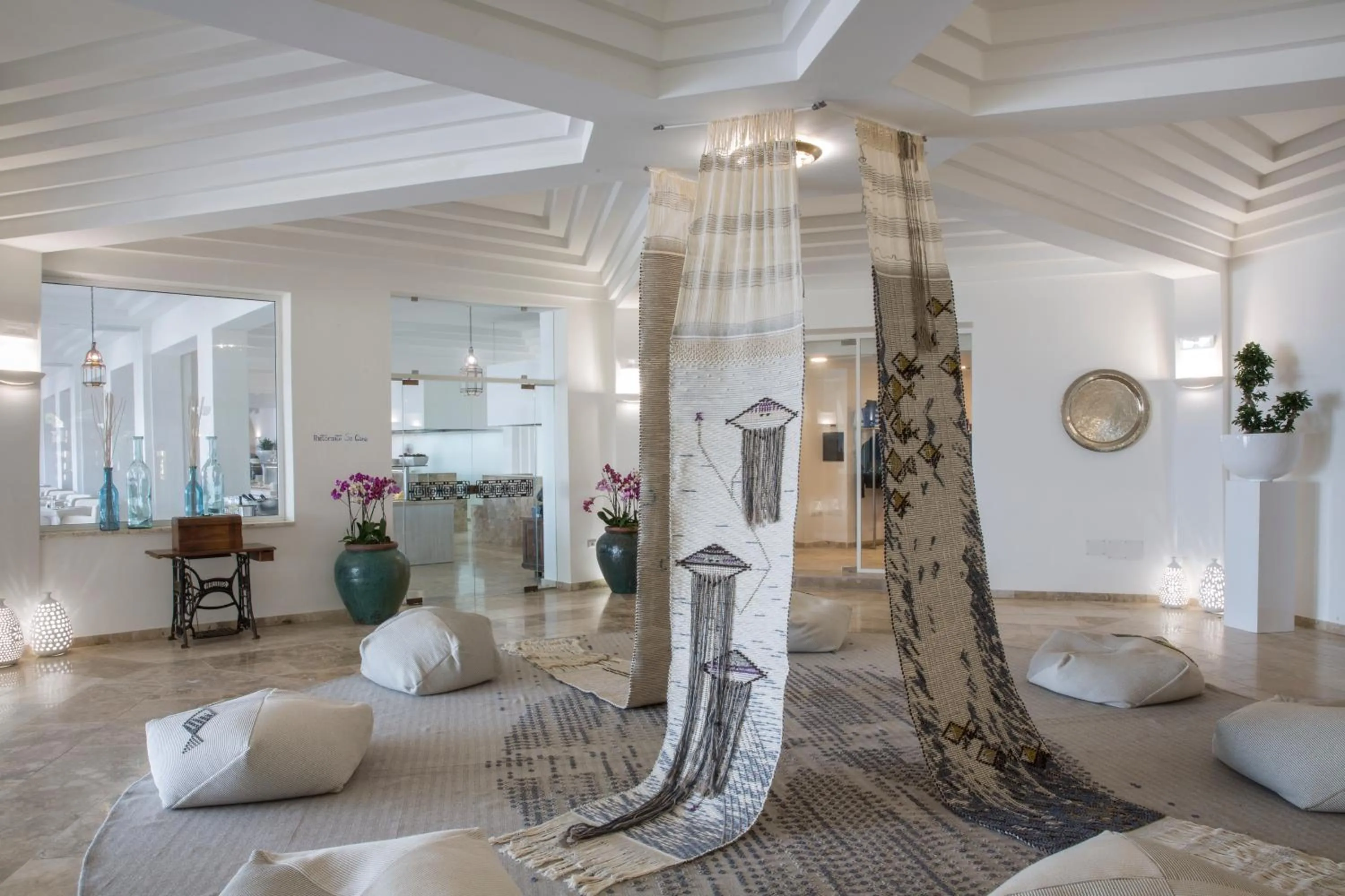 Lobby or reception in Falkensteiner Resort Capo Boi