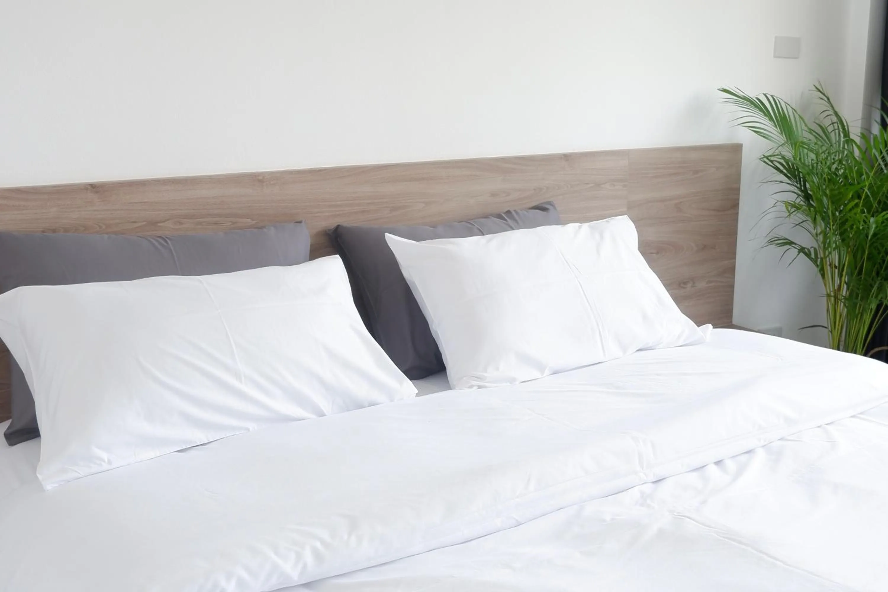 Bed in Darin Chiangmai Hotel and Residence