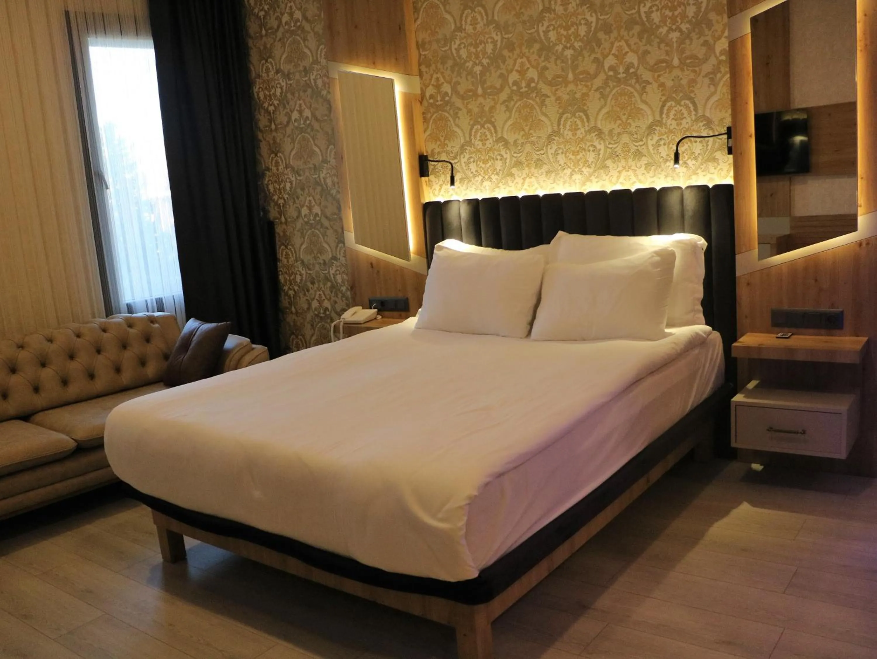 Photo of the whole room, Bed in Isnova Hotel Airport