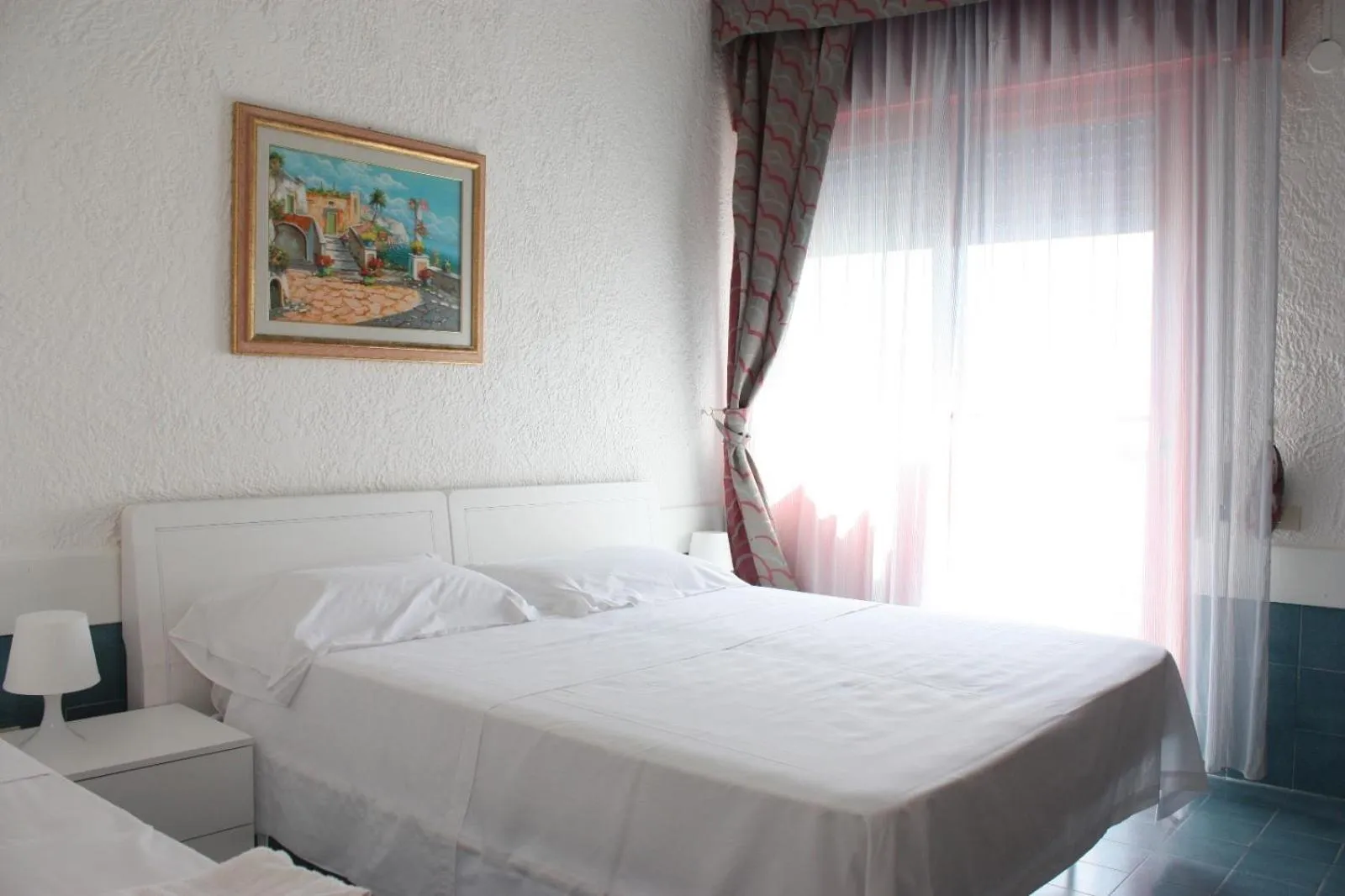 Bed in Marina Club Hotel