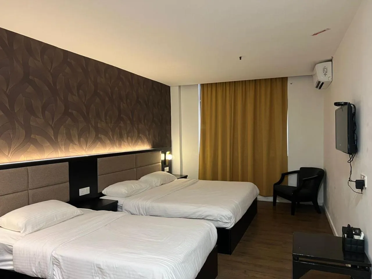 Bed in Remington Hotel