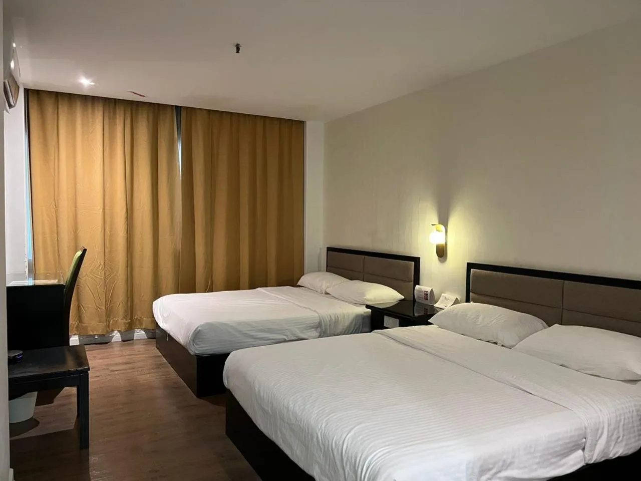 Bed in Remington Hotel