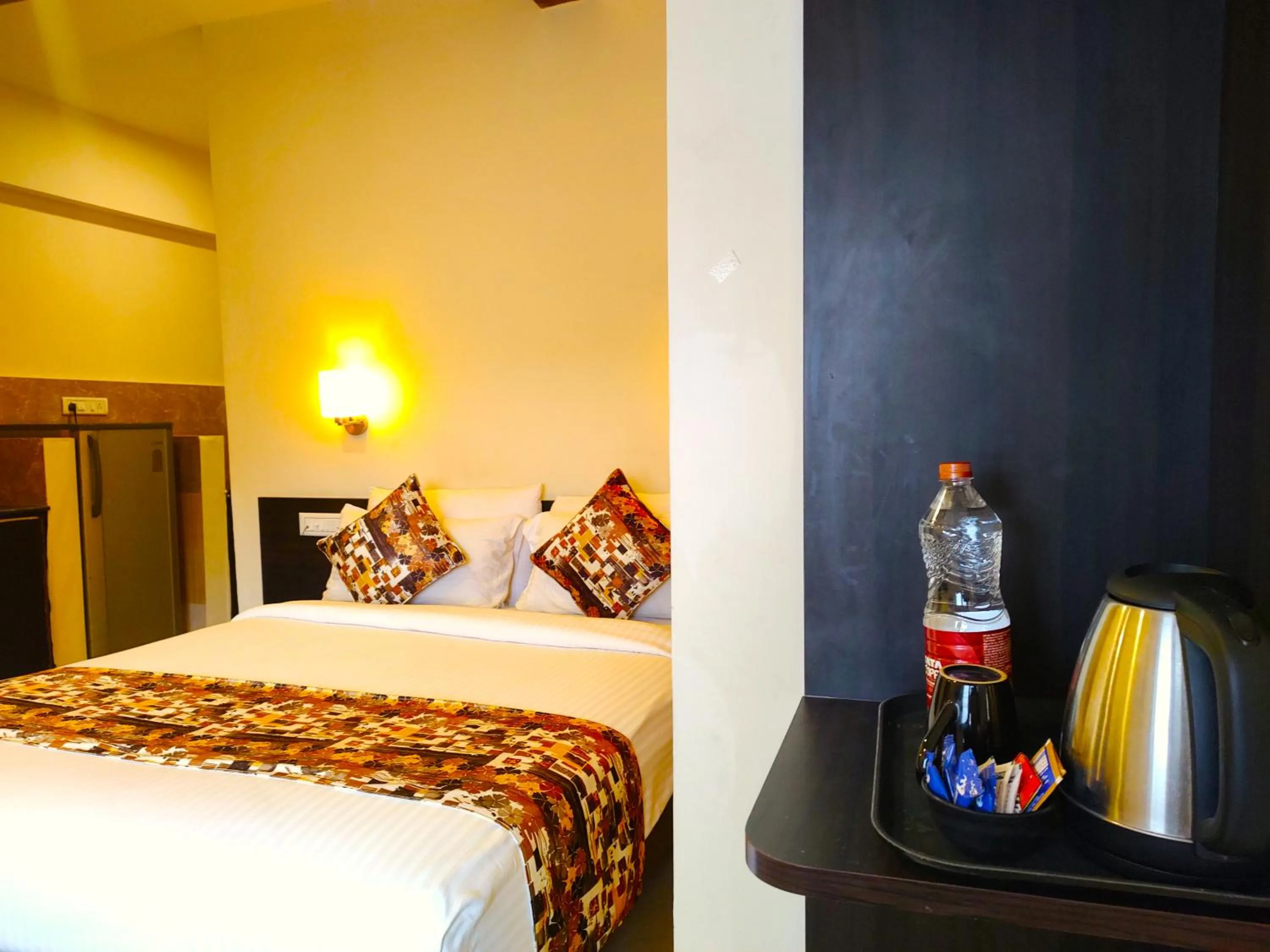 Bed in Athasri Hotel HSR Layout