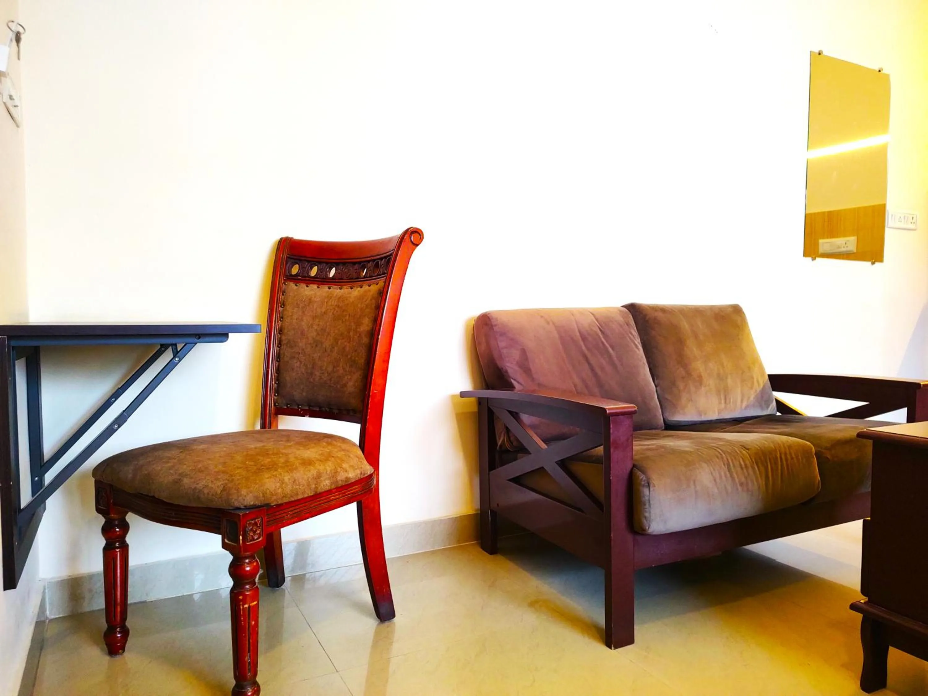 Living room in Athasri Hotel HSR Layout