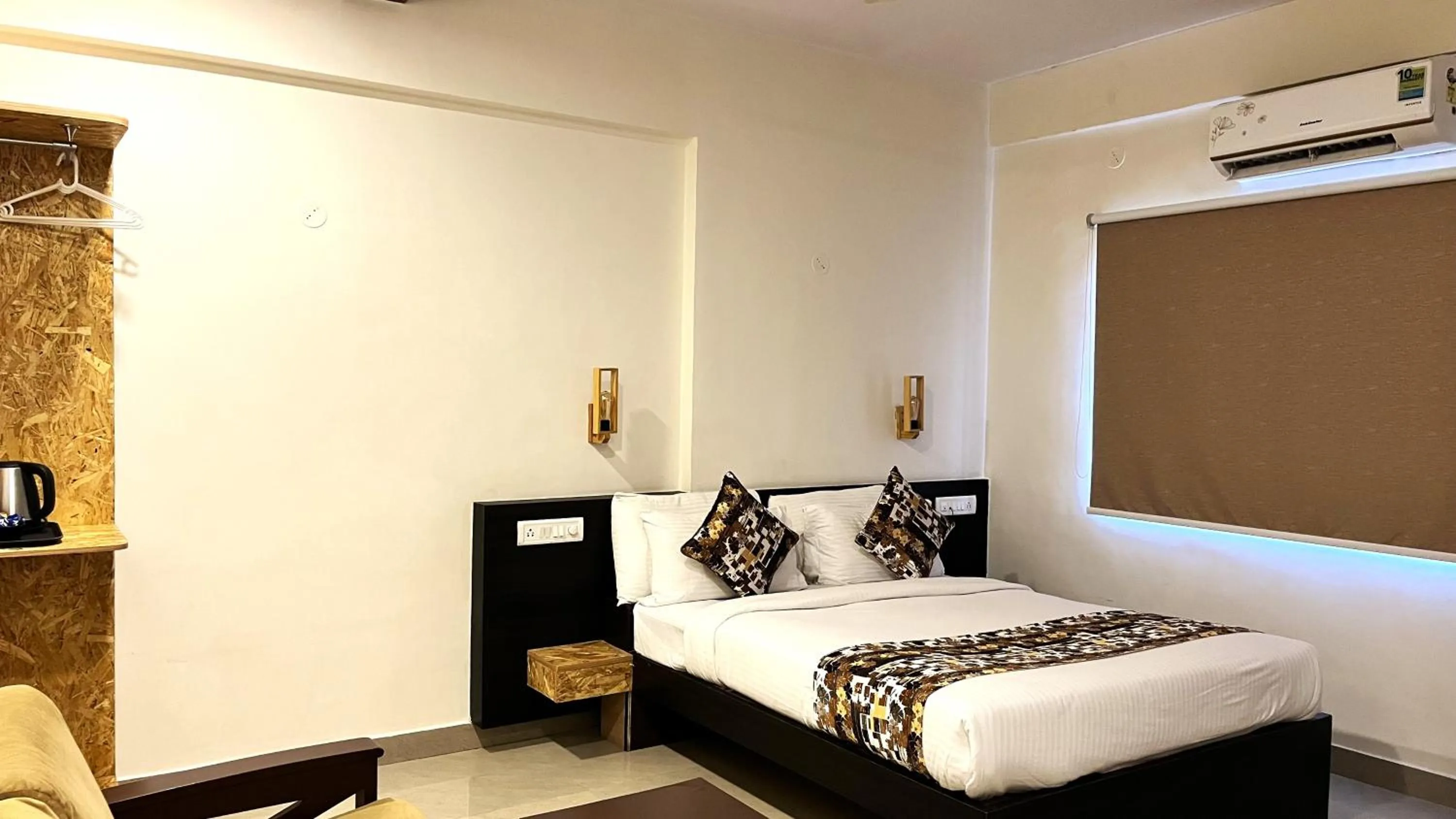 Bed in Athasri Hotel HSR Layout