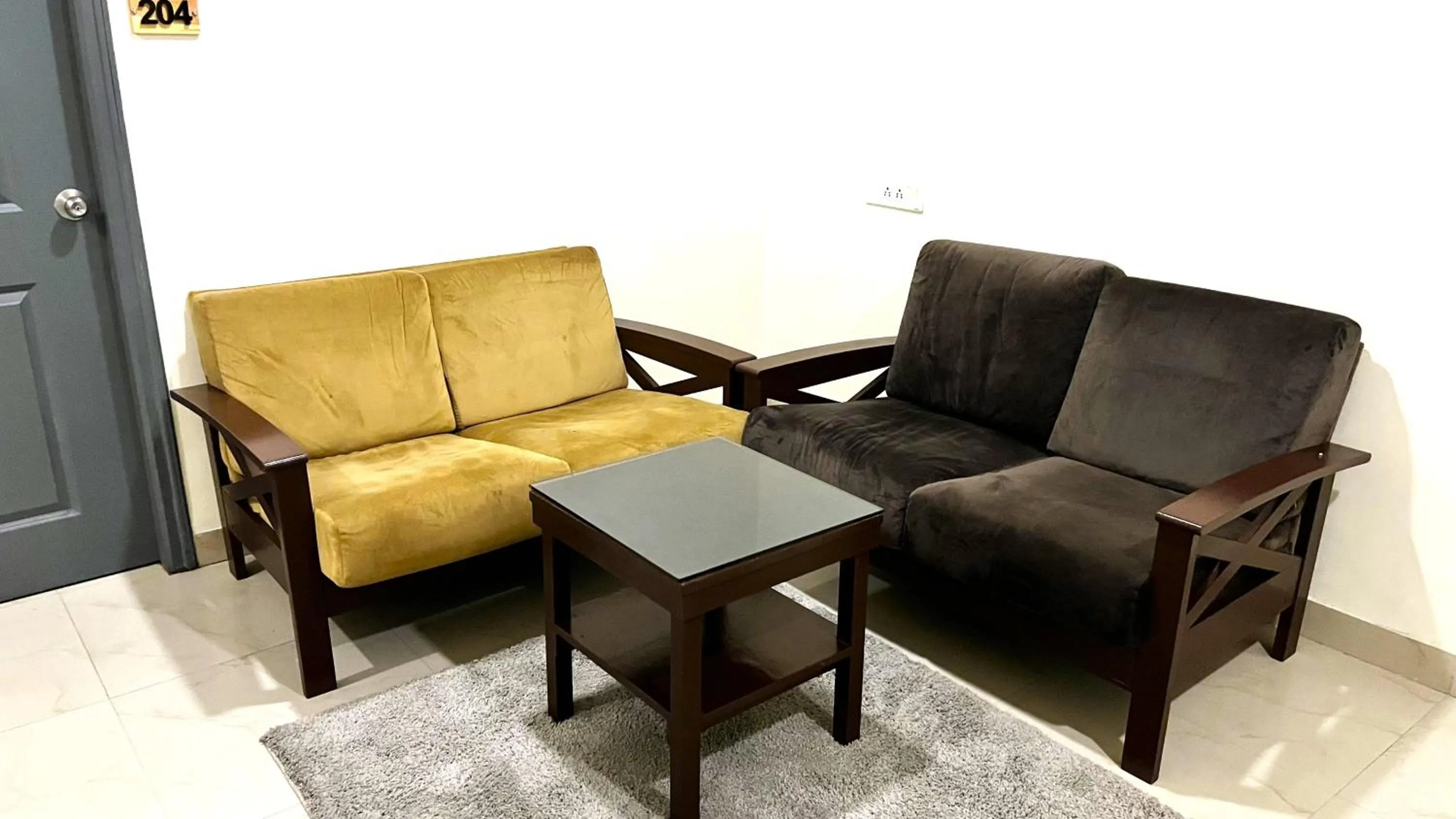 Seating area in Athasri Hotel HSR Layout