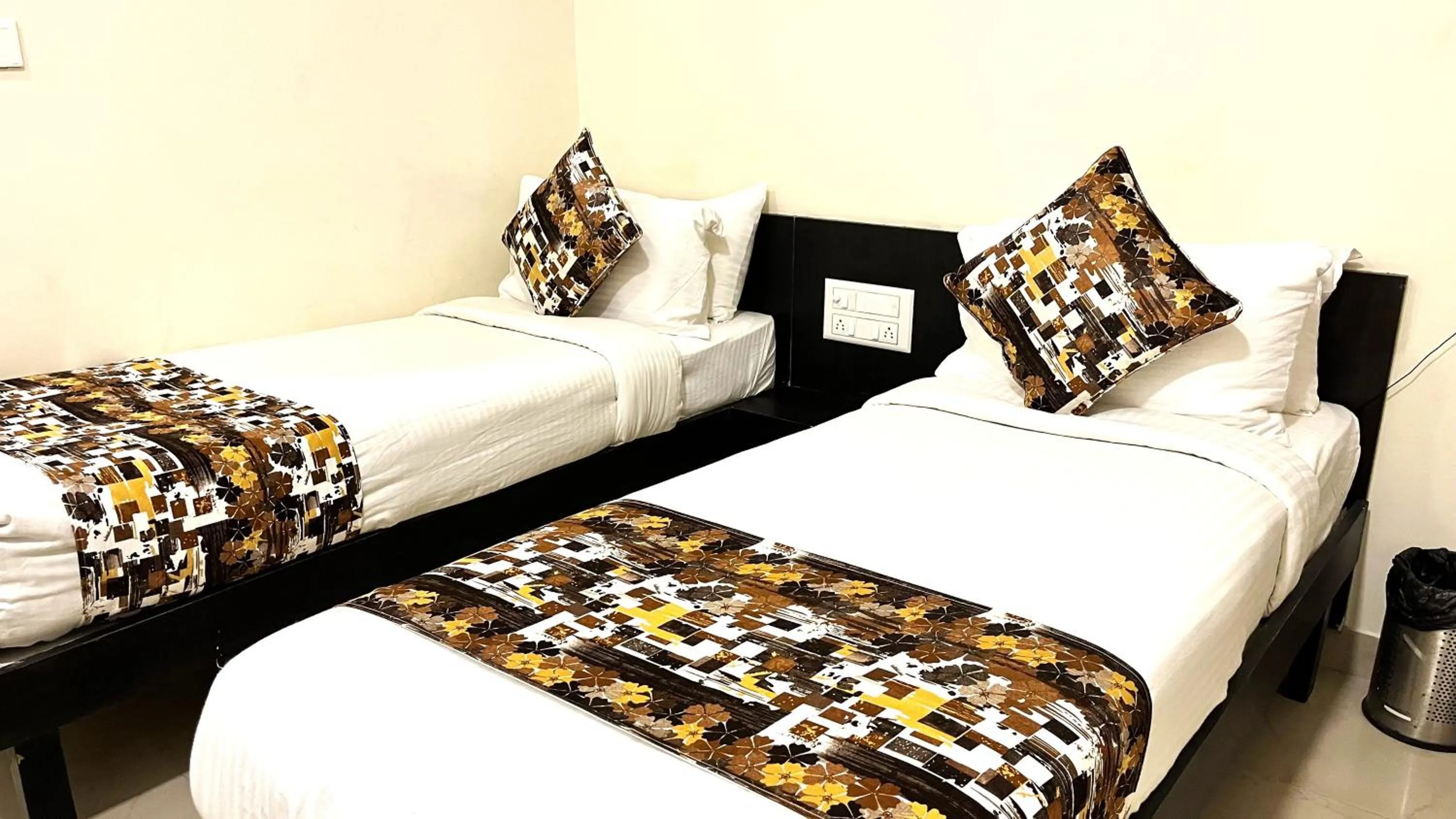 Bed in Athasri Hotel HSR Layout
