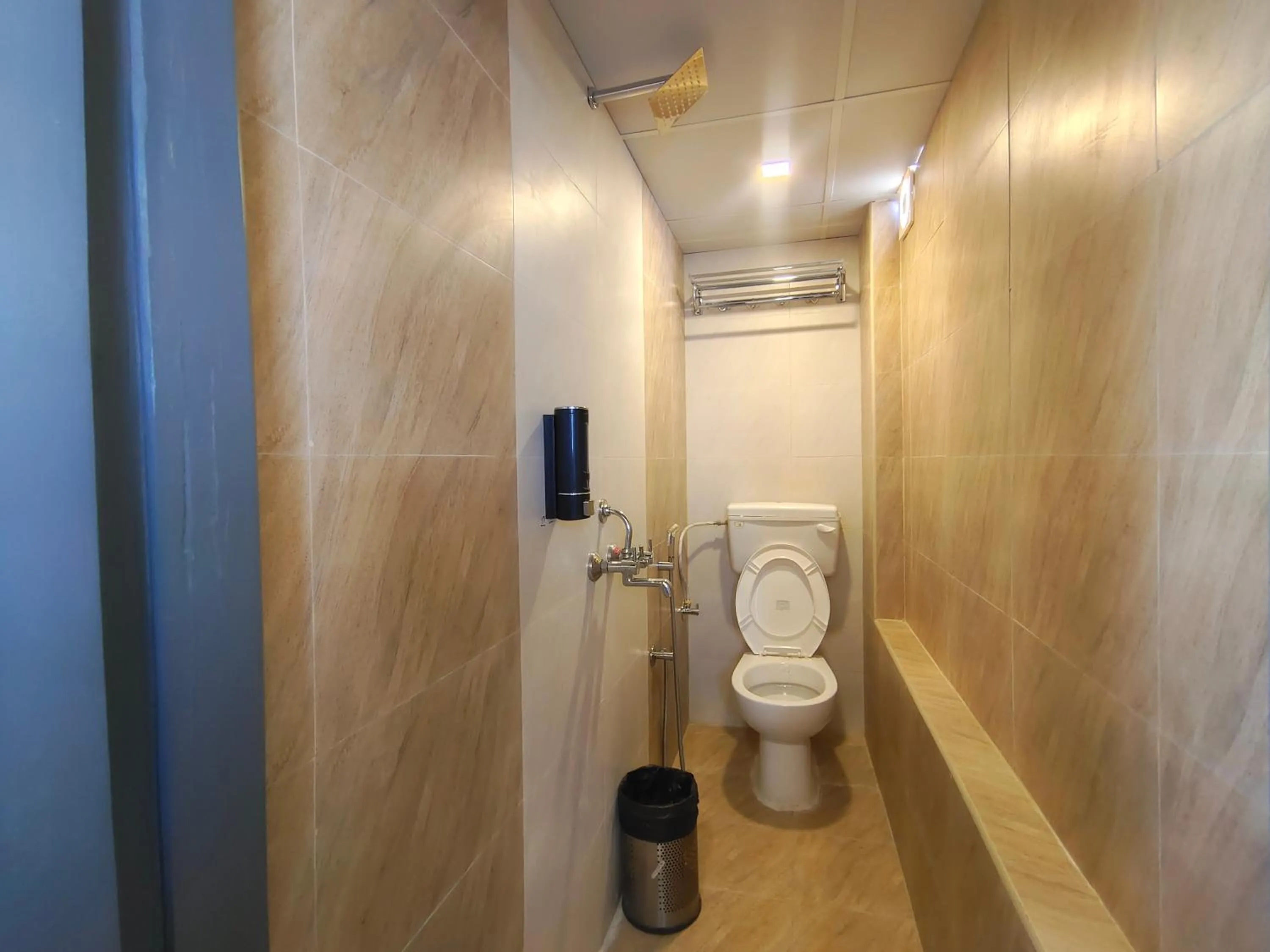 Shower in Athasri Hotel HSR Layout