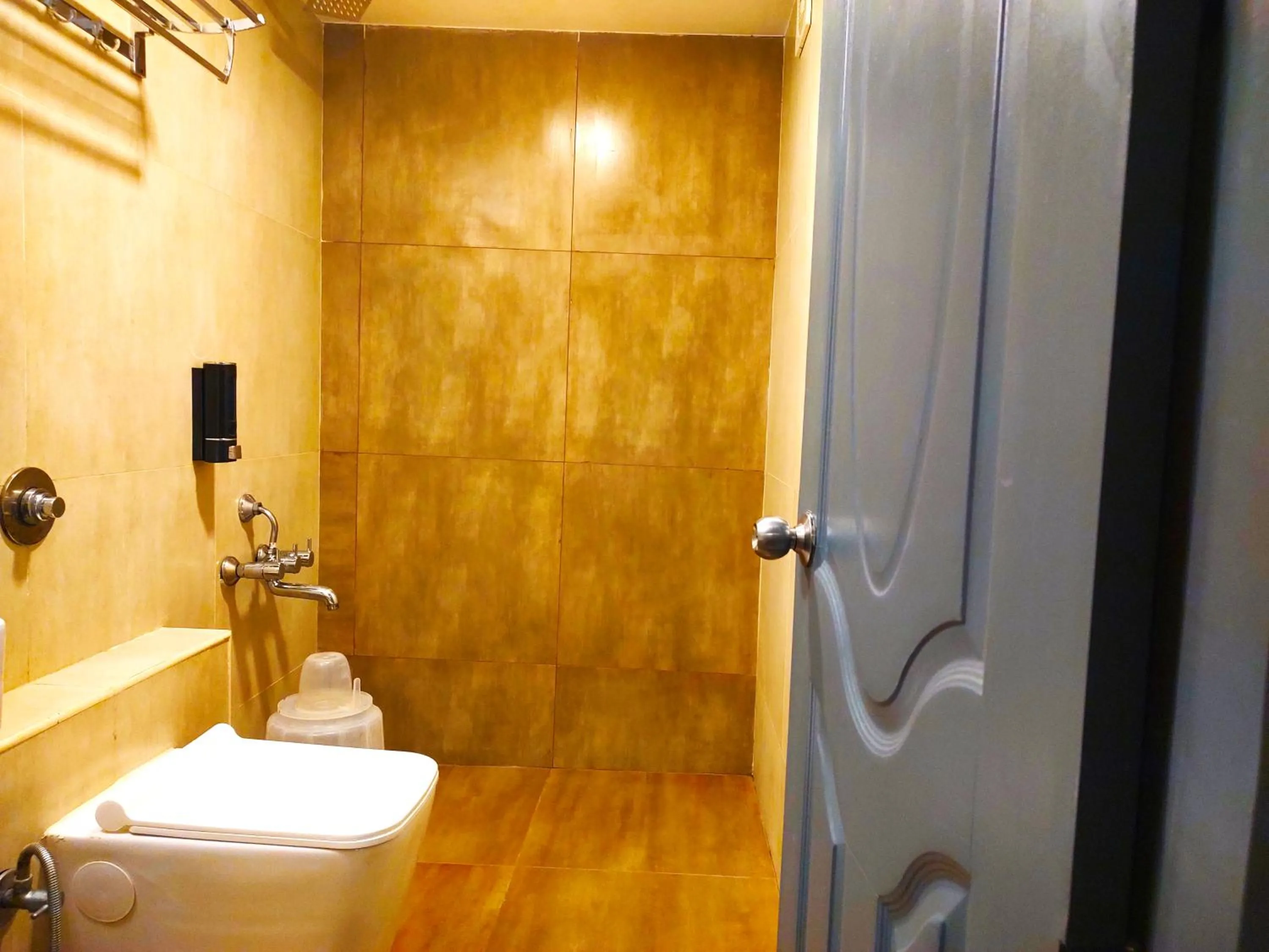 Shower in Athasri Hotel HSR Layout