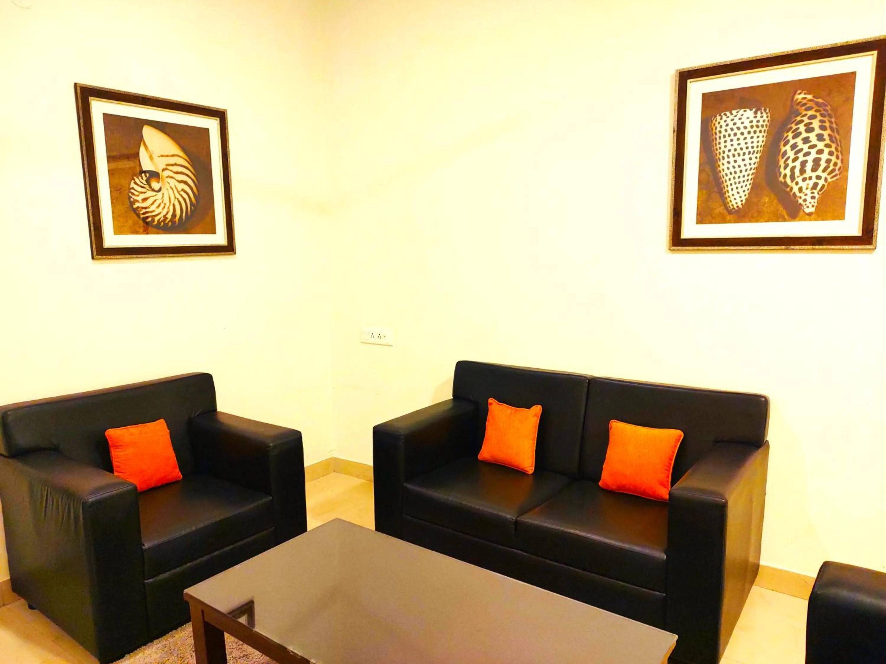 Living room in Athasri Hotel HSR Layout