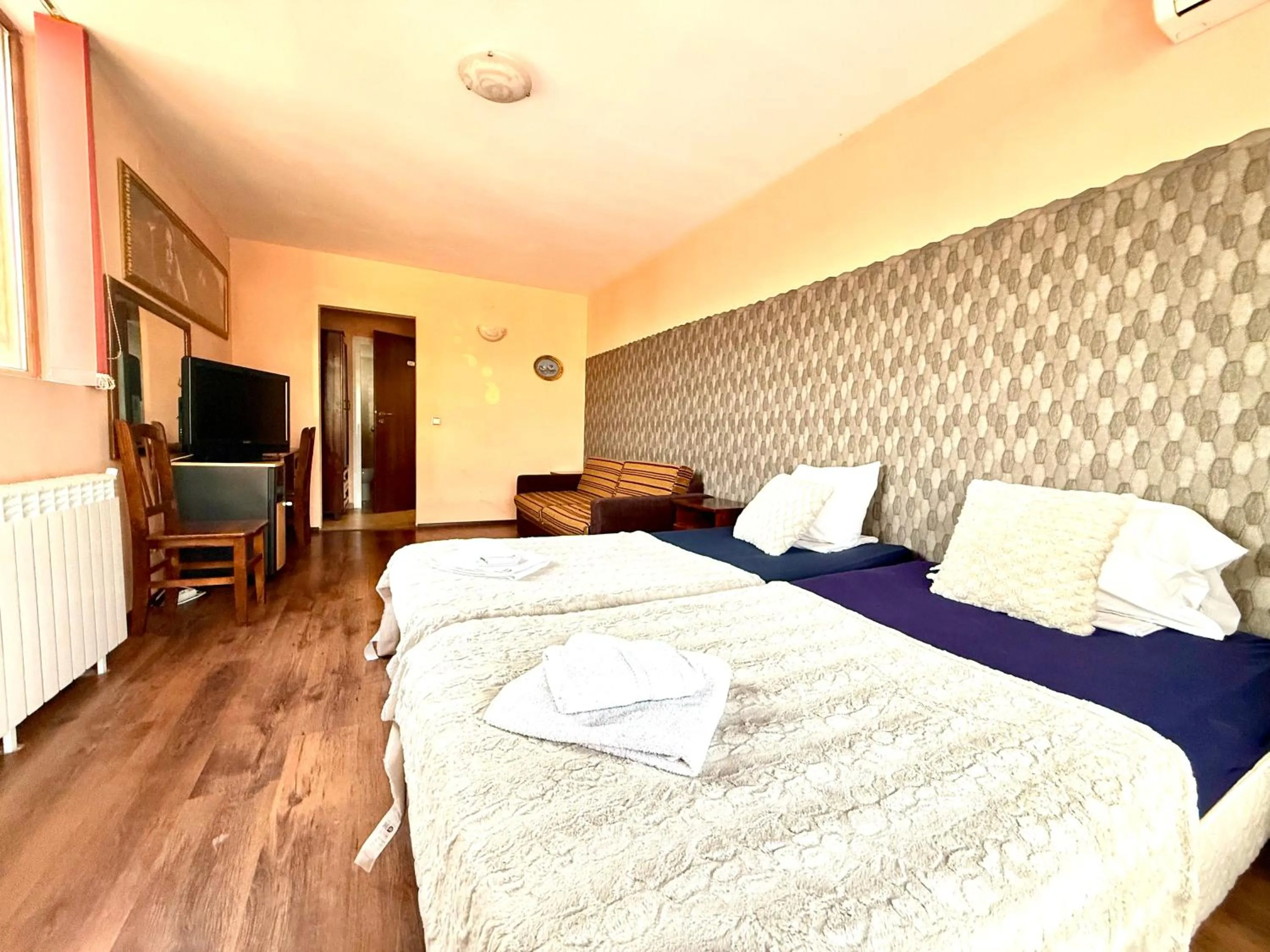 Bedroom in Family Hotel Carpe Diem