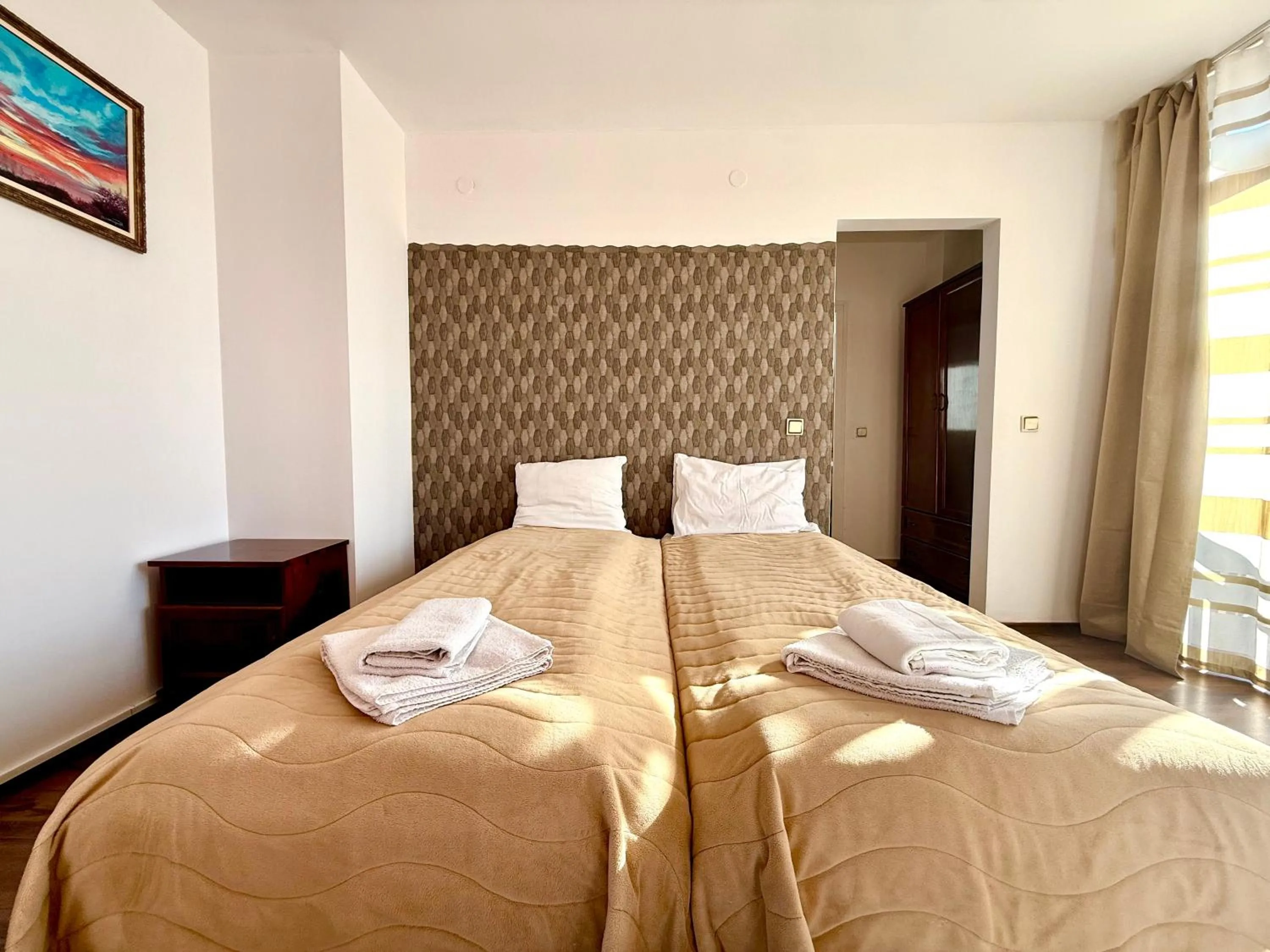 Bed in Family Hotel Carpe Diem
